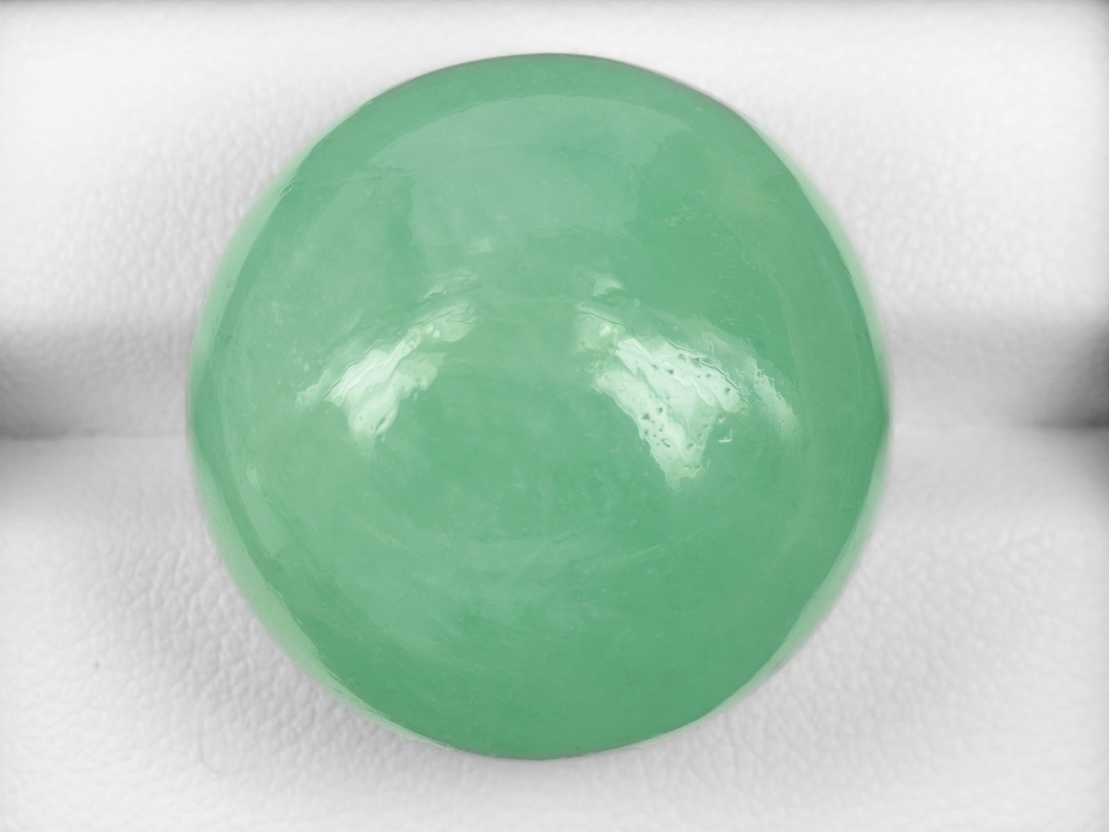 8800571-cabochon-pastel-green-russia-natural-emerald-78.86-ct