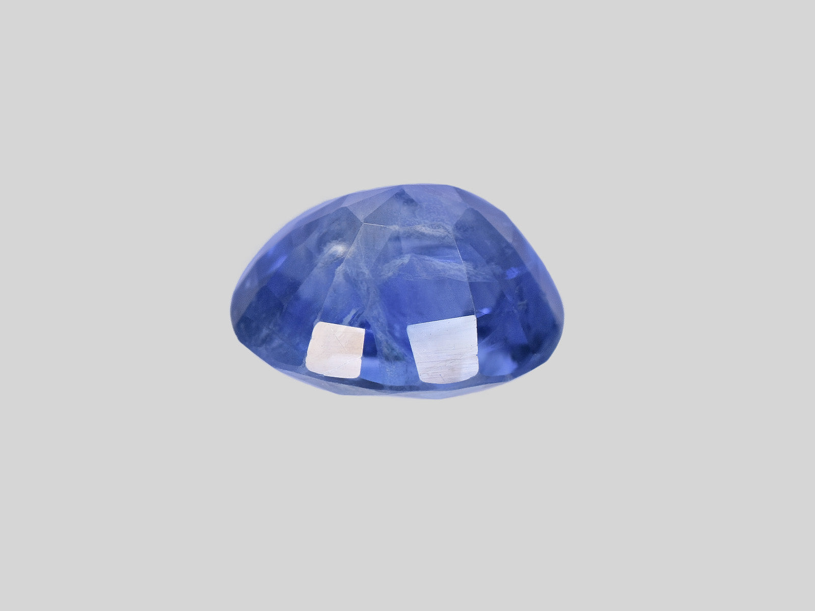 8801946-oval-intense-blue-changing-to-purplish-blue-gia-igi-kashmir-natural-color-change-sapphire-1.56-ct