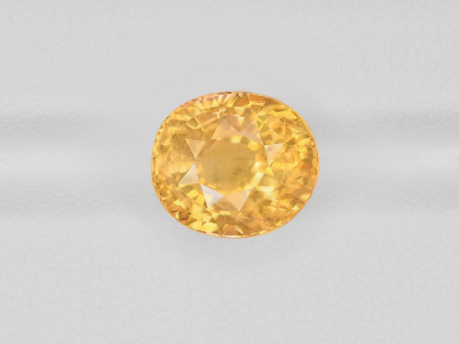 8800996-oval-lustrous-orangy-yellow-grs-sri-lanka-natural-yellow-sapphire-7.03-ct