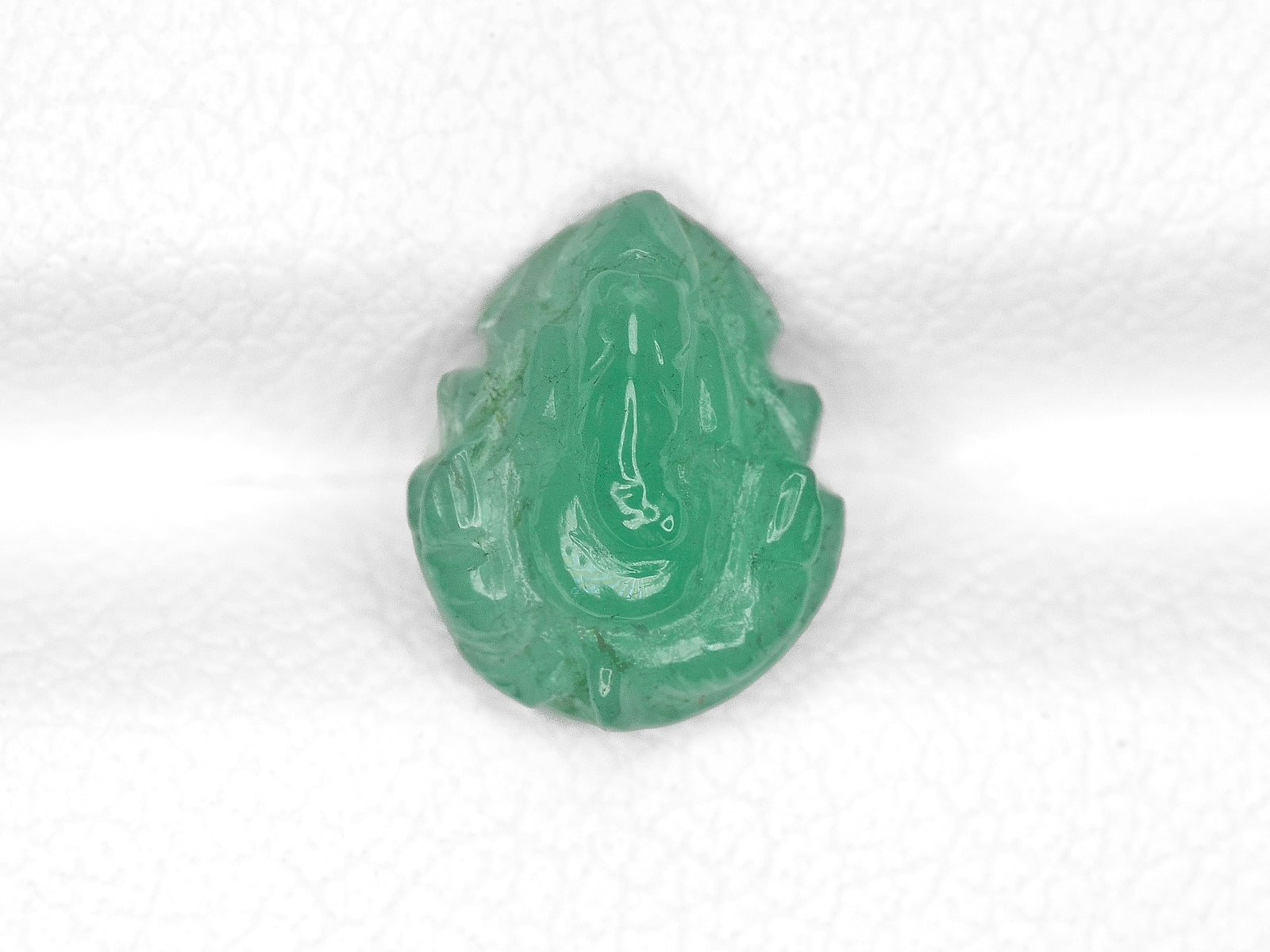 8800758-carved-bright-green-igi-zambia-natural-emerald-1.31-ct