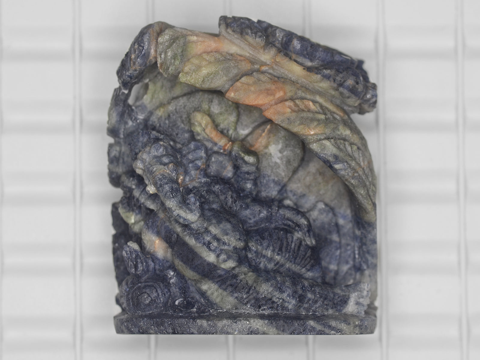 8800840-carved-blue-&-greyish-green-bi-color-gii-sierra-leone-natural-blue-sapphire-1808.90-ct