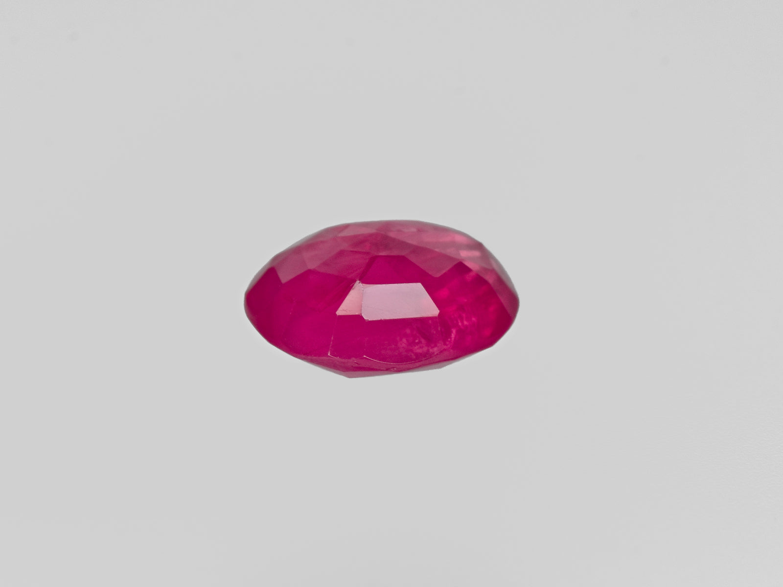 8801067-oval-deep-pinkish-red-igi-burma-natural-ruby-1.24-ct