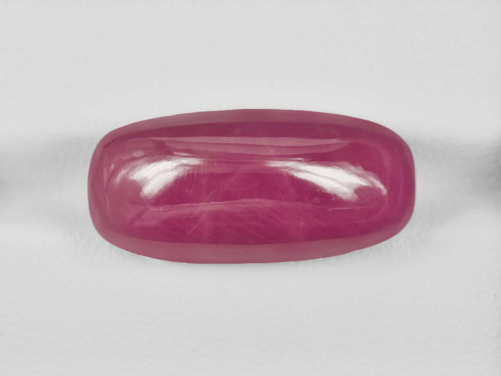 8801406-cabochon-pinkish-red-grs-guinea-natural-ruby-37.61-ct