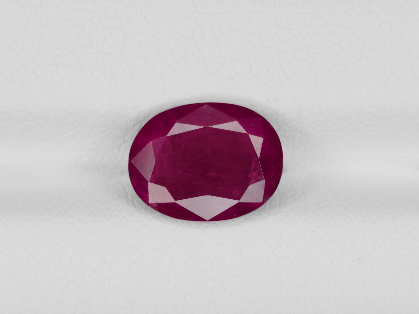 8800951-cabochon-deep-purplish-red-igi-guinea-natural-ruby-3.25-ct