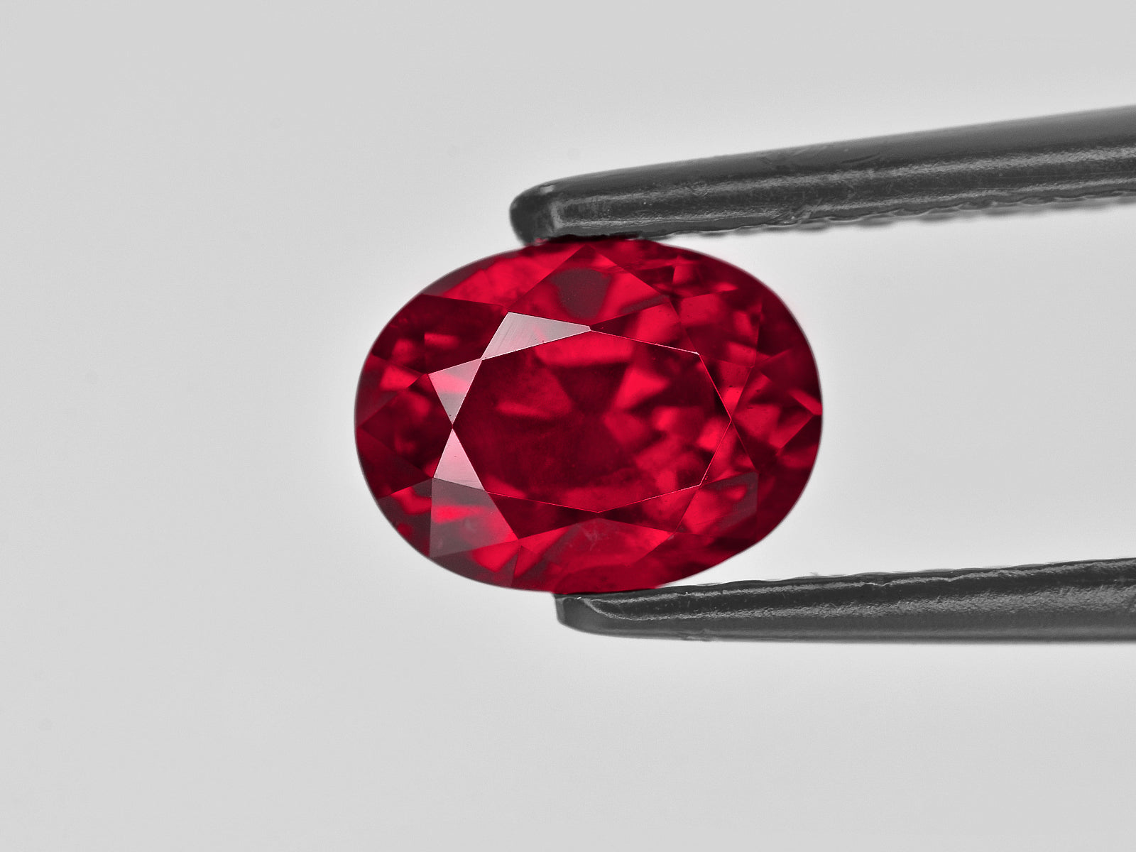 8801288-oval-fiery-intense-pigeon-blood-red-grs-madagascar-natural-ruby-2.42-ct