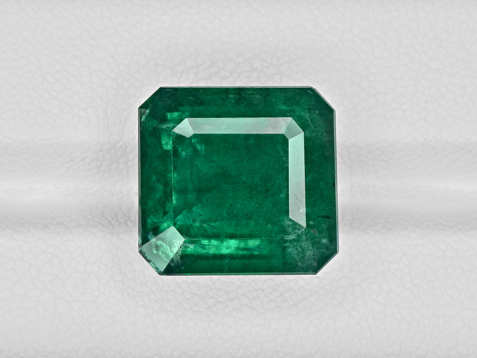 8801049-octagonal-rich-velvety-deep-green-grs-zambia-natural-emerald-15.83-ct
