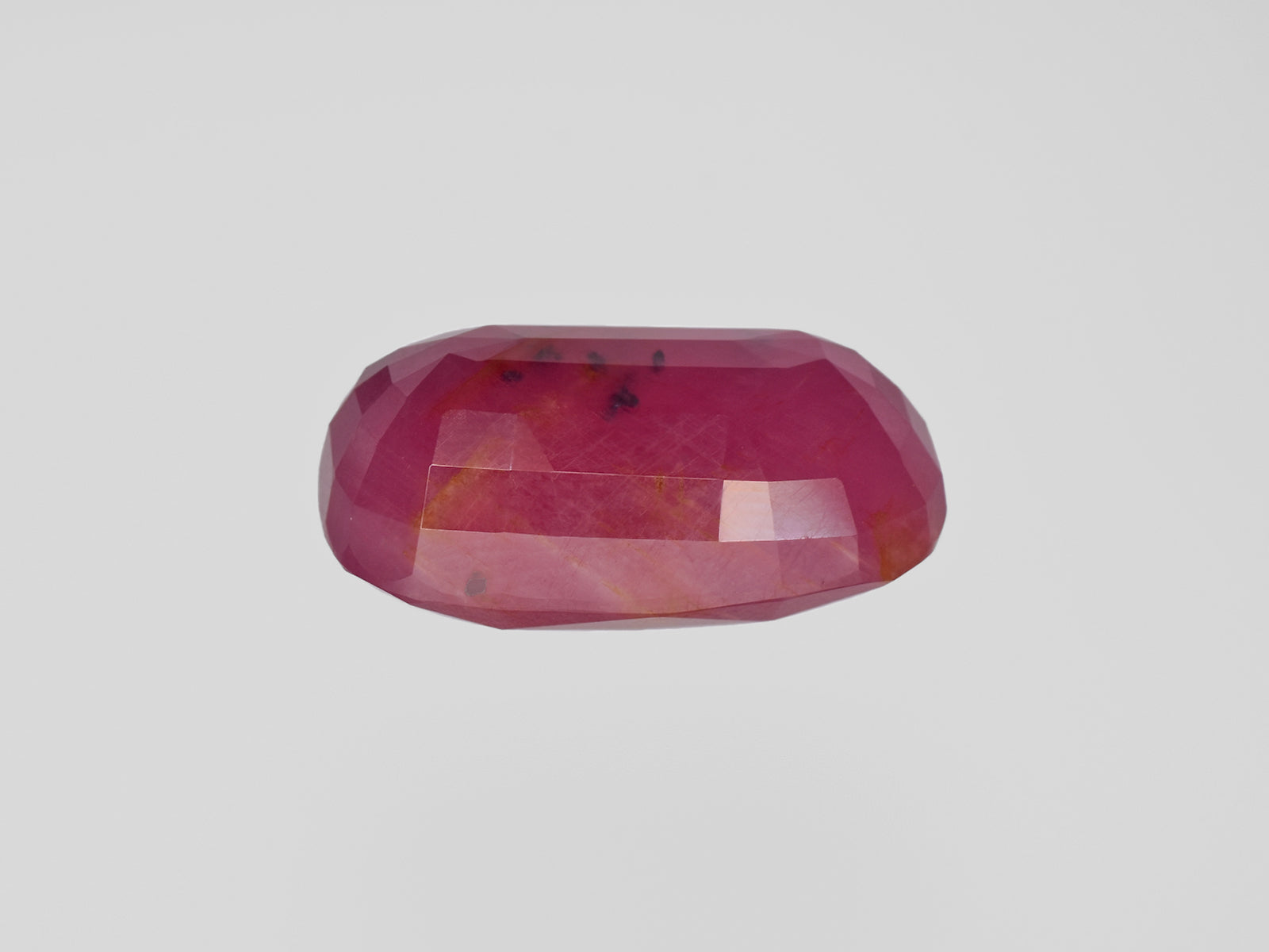 8801203-cushion-pinkish-red-gii-guinea-natural-ruby-31.01-ct