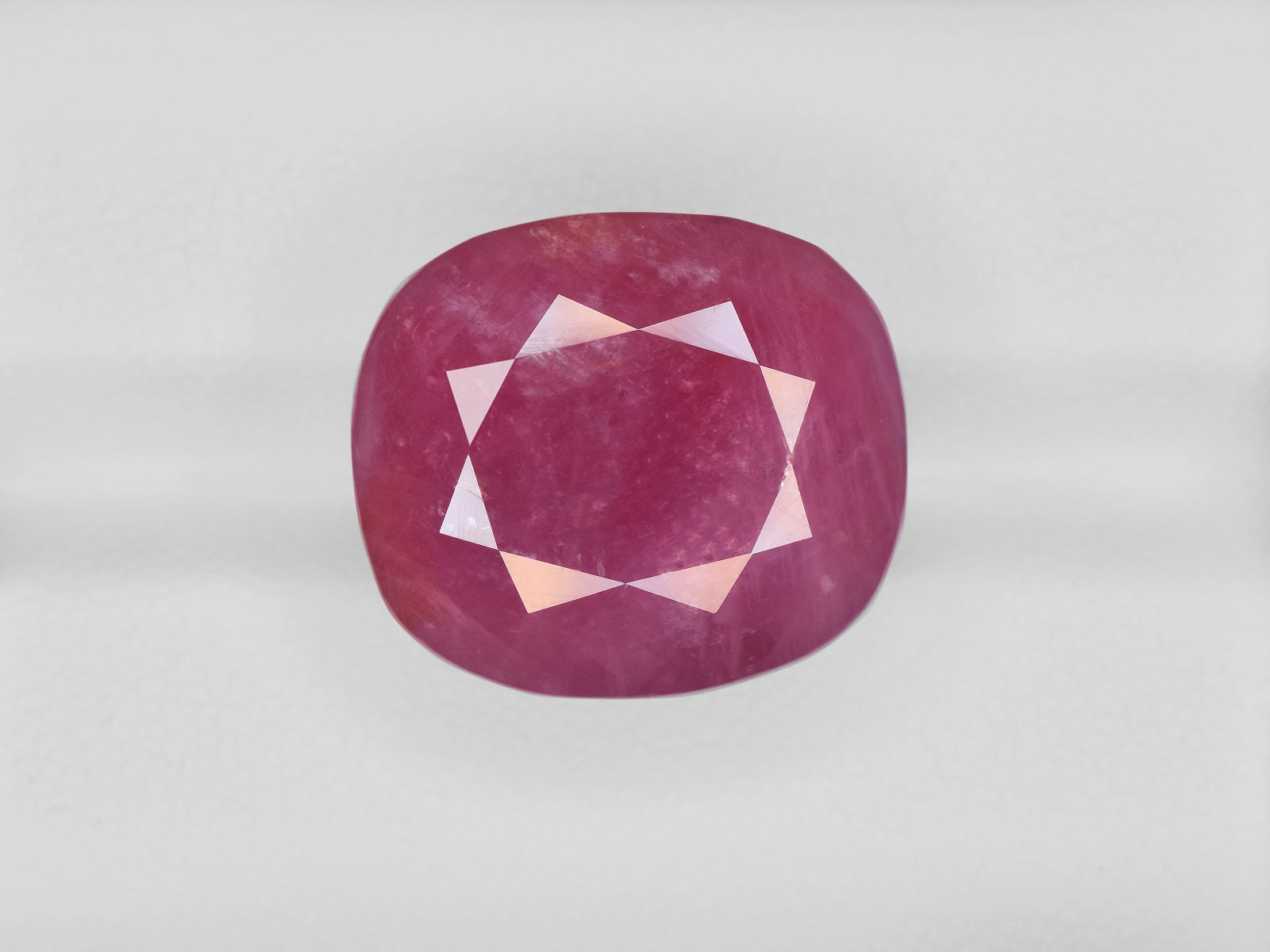 8801204-cushion-pinkish-red-gii-guinea-natural-ruby-29.40-ct