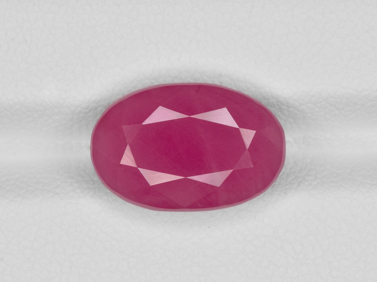 8801226-oval-pinkish-red-igi-guinea-natural-ruby-7.78-ct