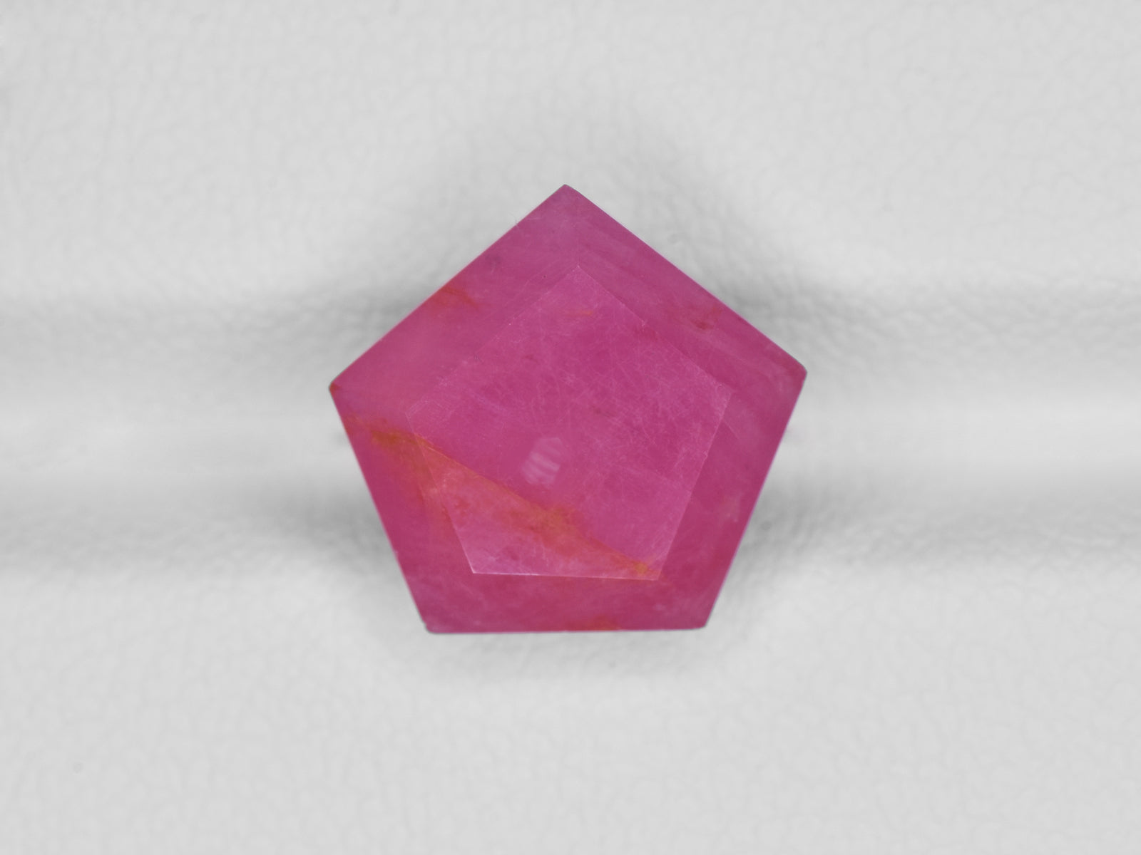 8801228-fancy-lively-pinkish-red-wih-slight-orange-staining-igi-guinea-natural-ruby-6.91-ct