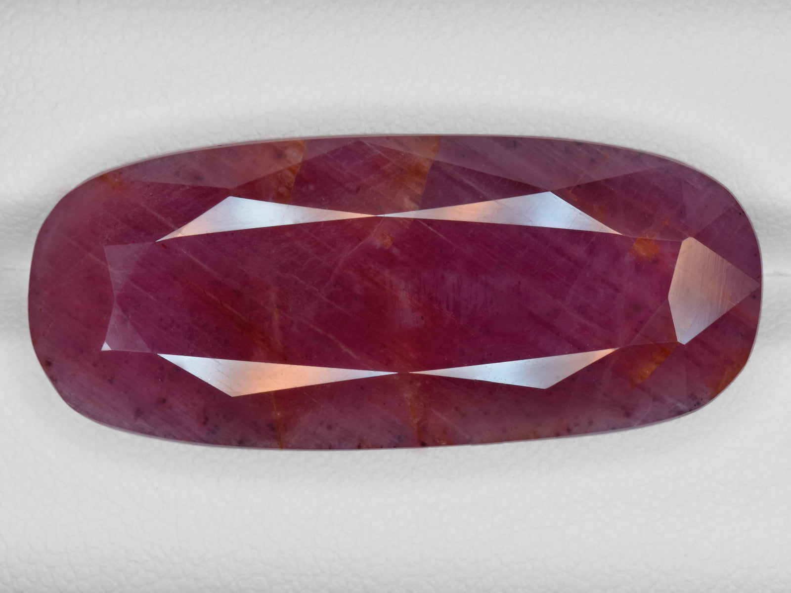 8801235-cushion-pinkish-red-with-orange-staining-gii-liberia-natural-ruby-38.76-ct