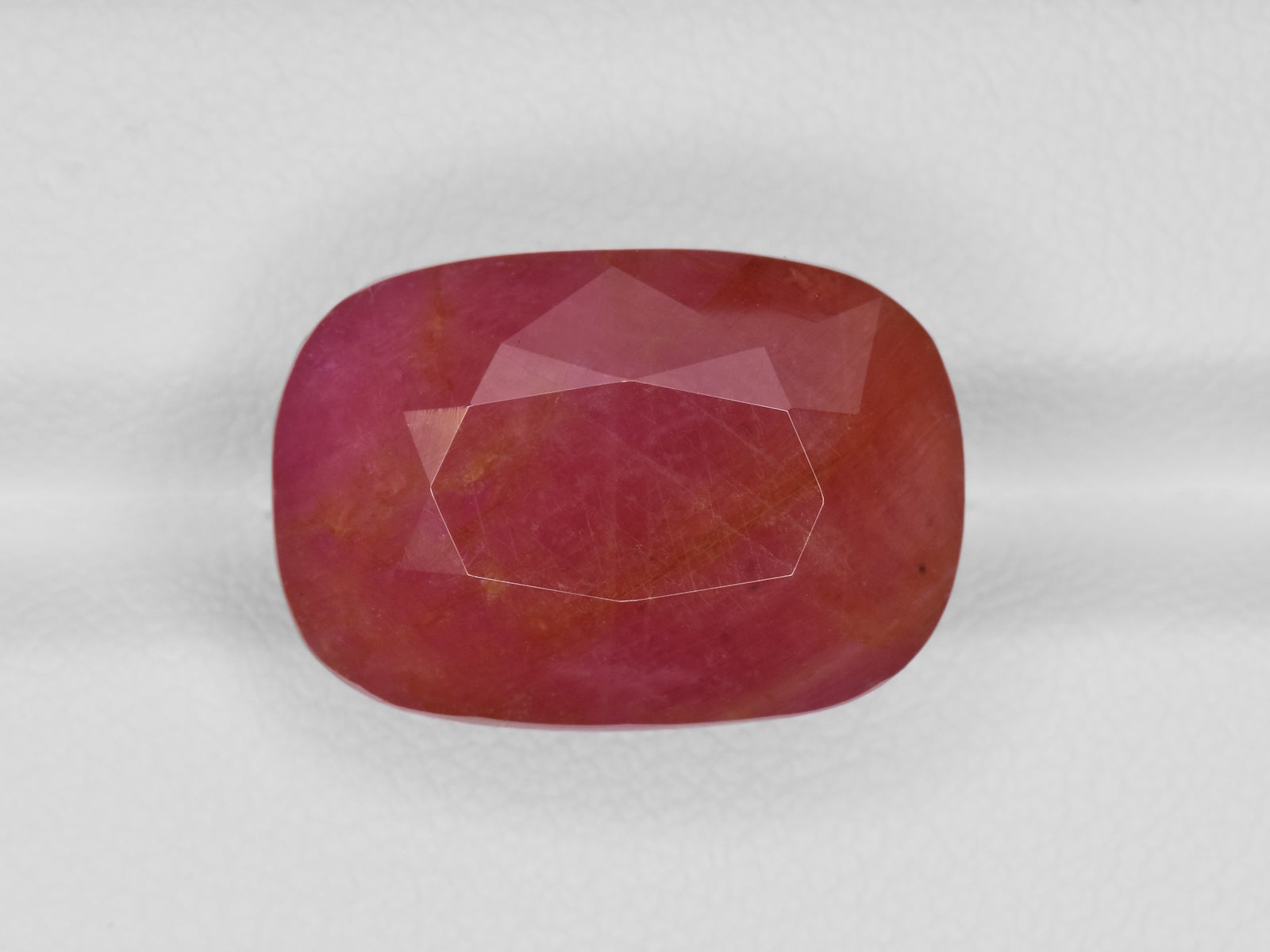 8801241-cushion-pinkish-orangish-red-gii-guinea-natural-ruby-24.88-ct