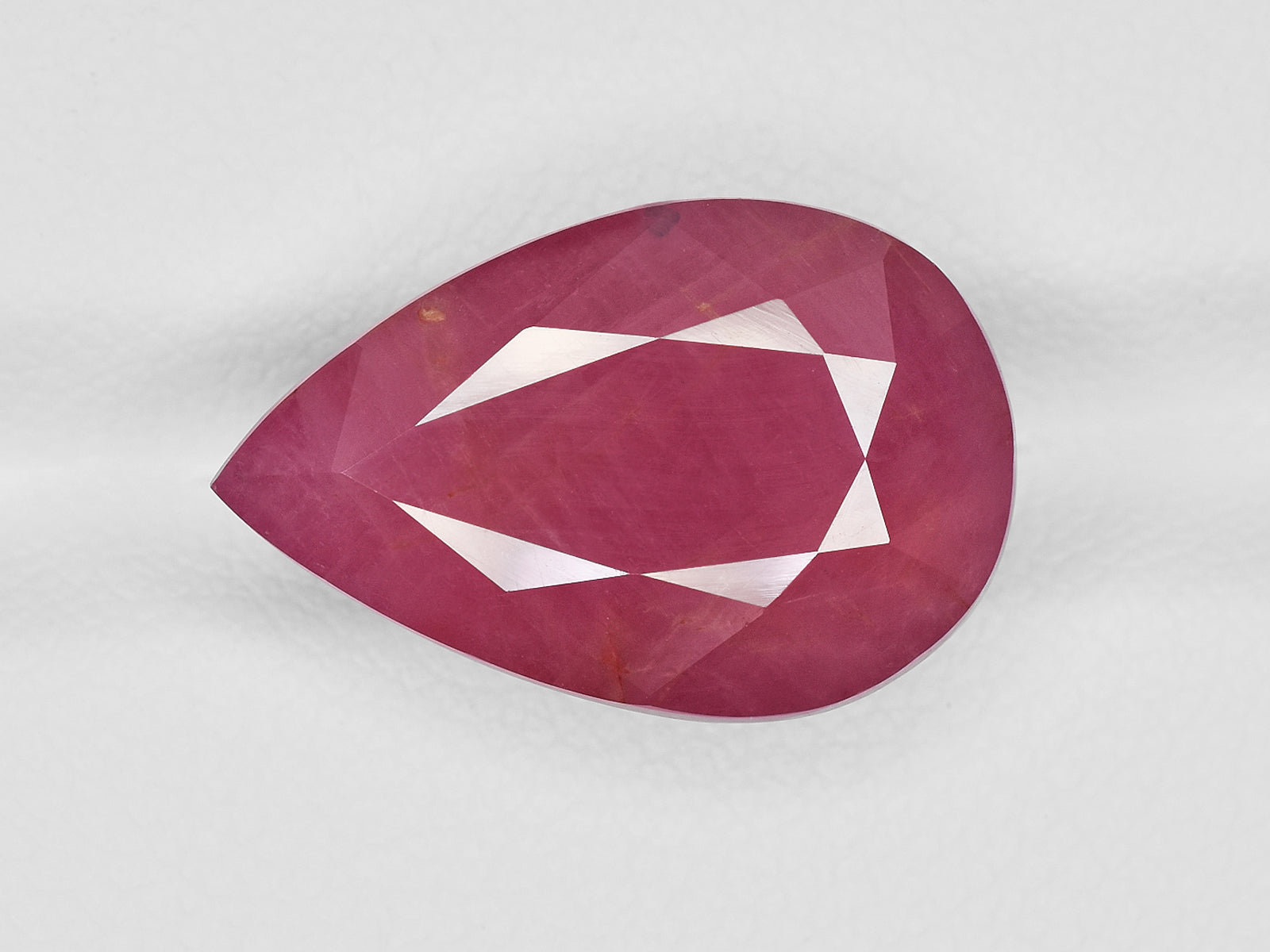 8801252-pear-pinkish-red-gii-guinea-natural-ruby-13.23-ct