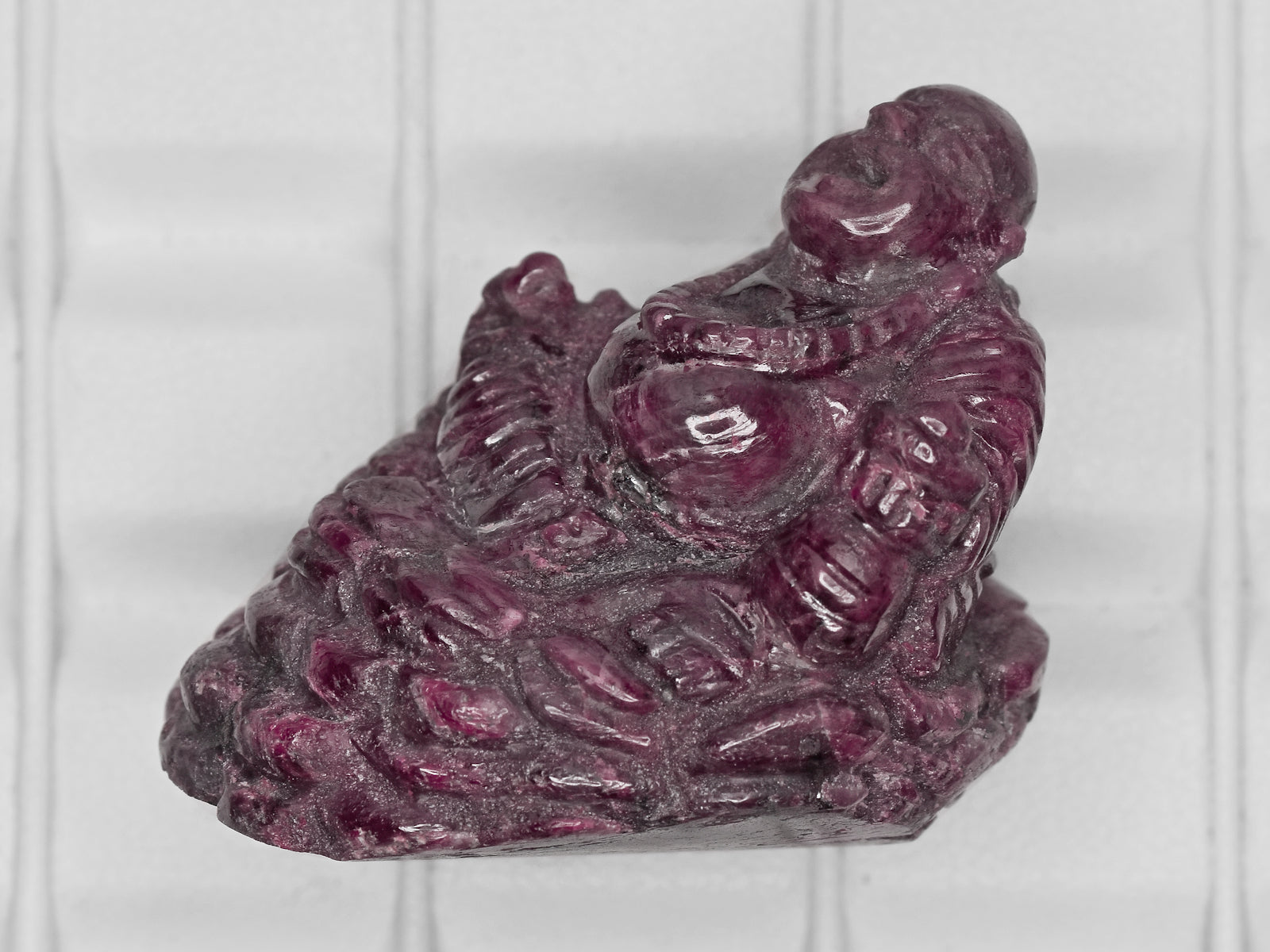 8801451-carved-purplish-red-gii-sierra-leone-natural-ruby-234.27-ct