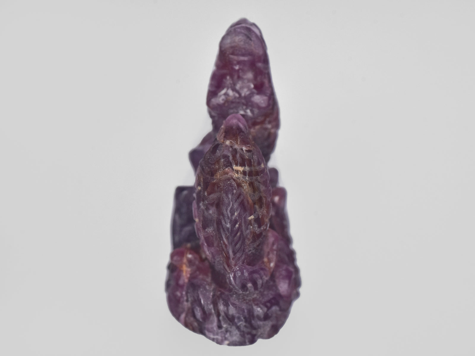 8801455-carved-purplish-red-gii-sierra-leone-natural-ruby-87.40-ct