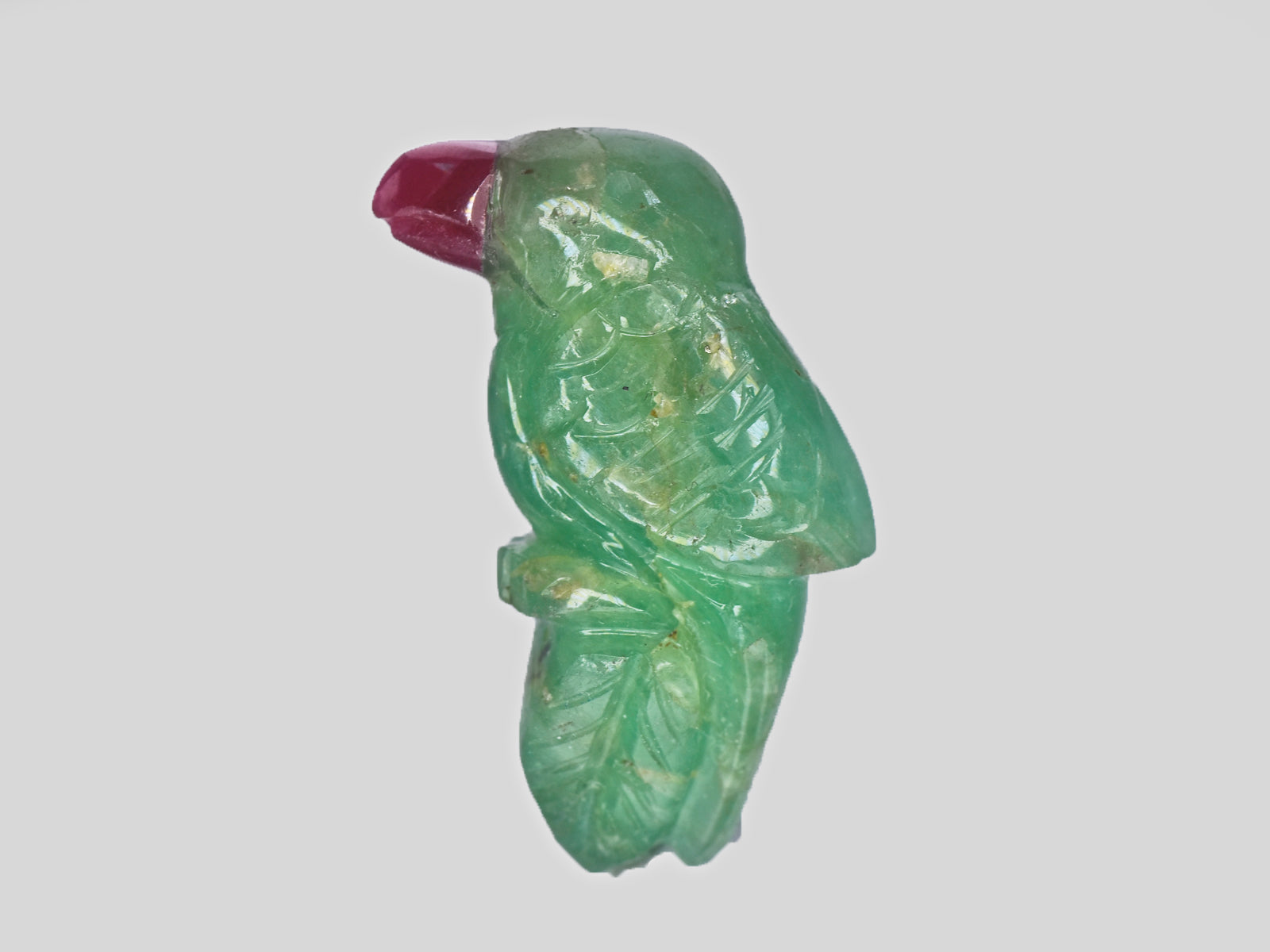 8801539-carved-green-&-red-gii-zambia-natural-emerald-14.83-ct
