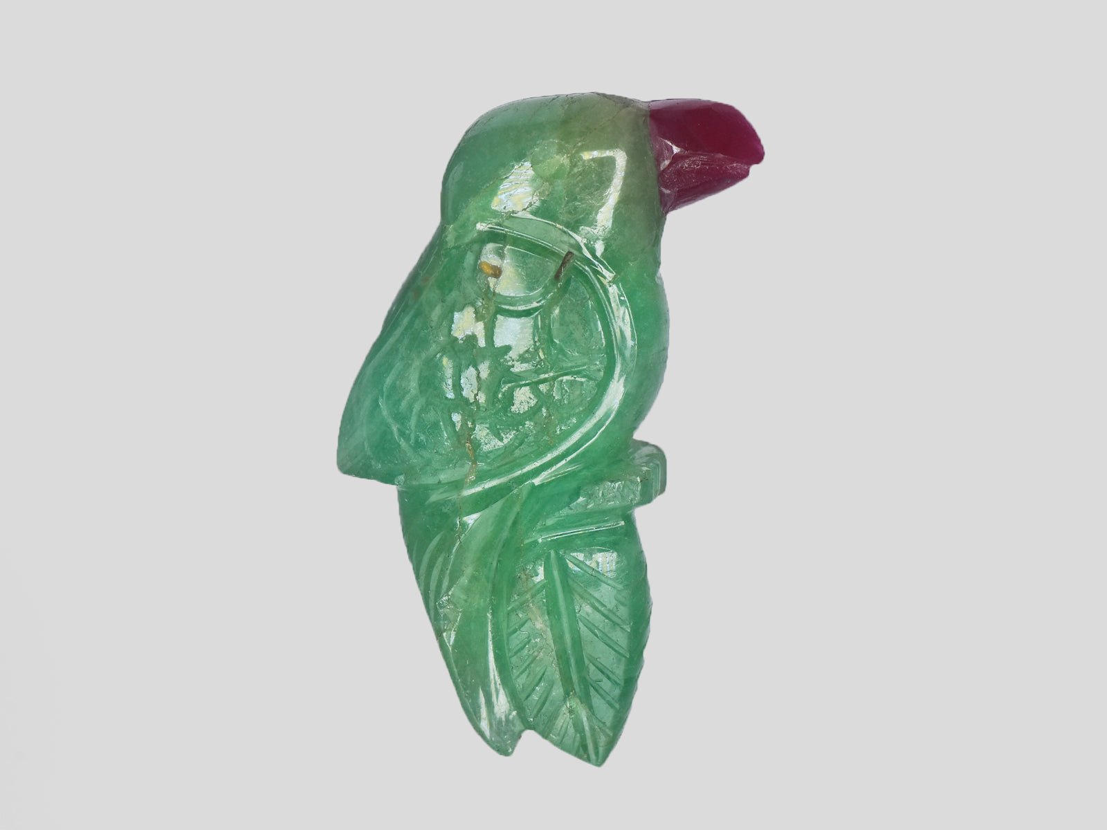 8801539-carved-green-&-red-gii-zambia-natural-emerald-14.83-ct