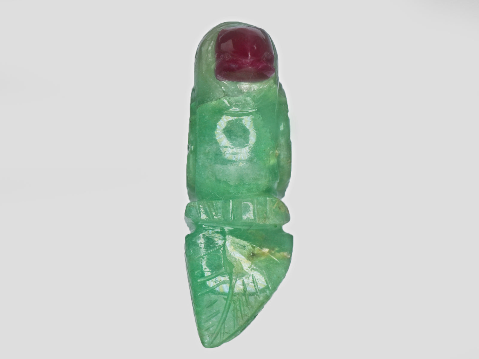 8801539-carved-green-&-red-gii-zambia-natural-emerald-14.83-ct