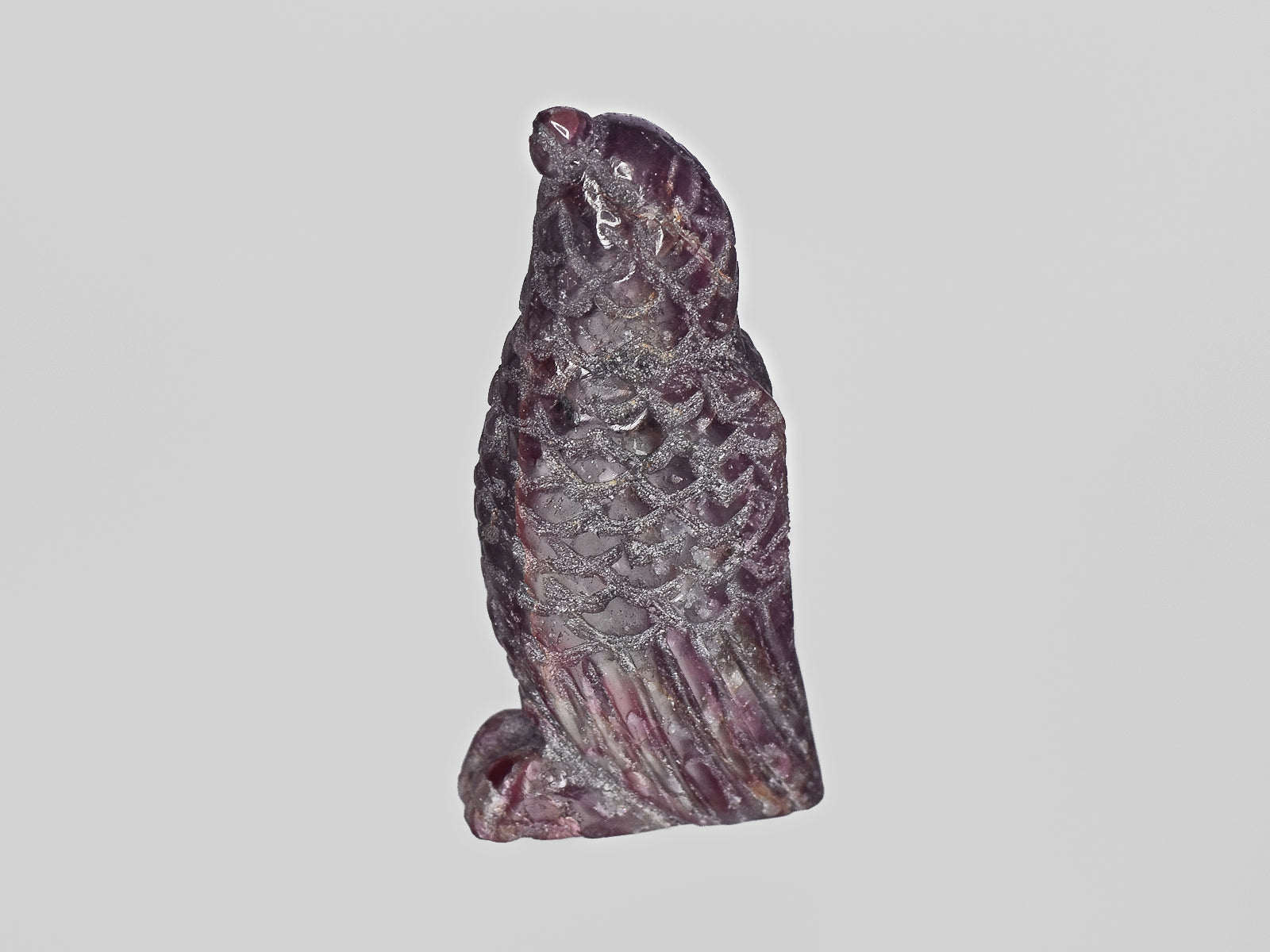 8801457-carved-dark-purple-red-gii-sierra-leone-natural-ruby-46.04-ct