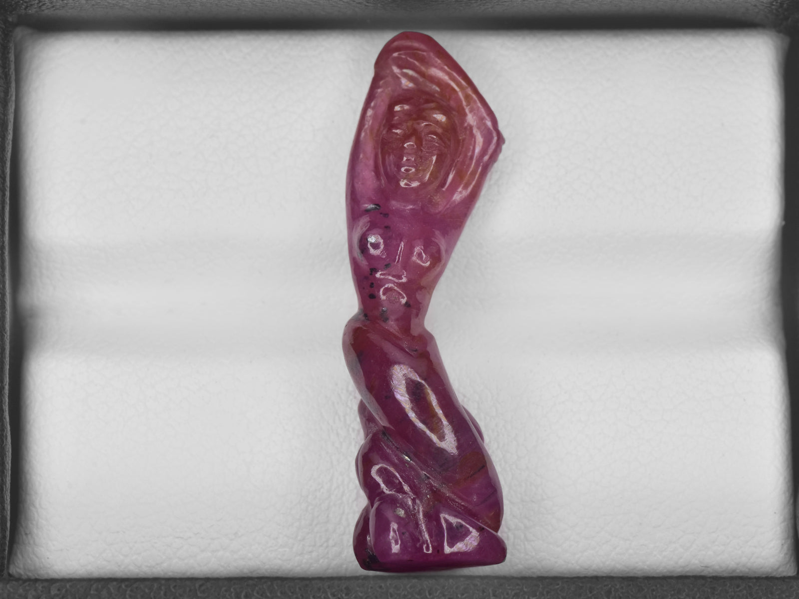 8801540-carved-purplish-red-gii-guinea-natural-ruby-17.56-ct