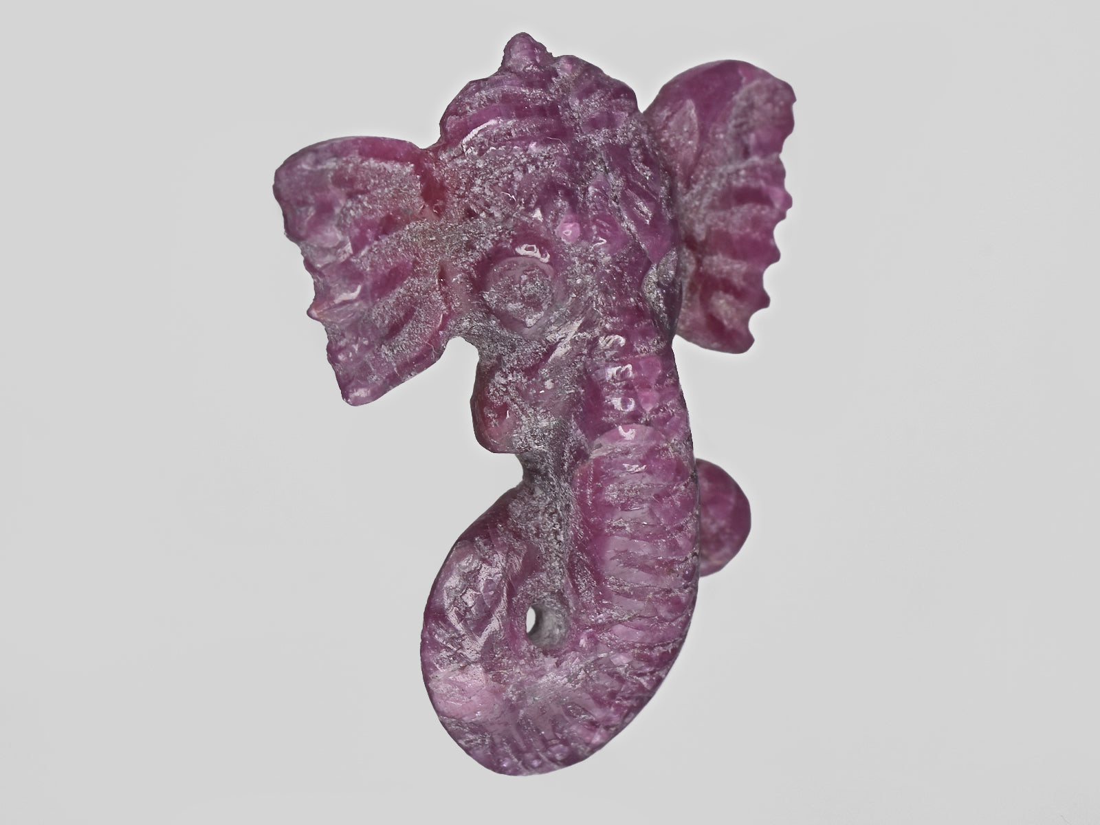8801541-carved-pinkish-red-gii-sierra-leone-natural-ruby-11.60-ct