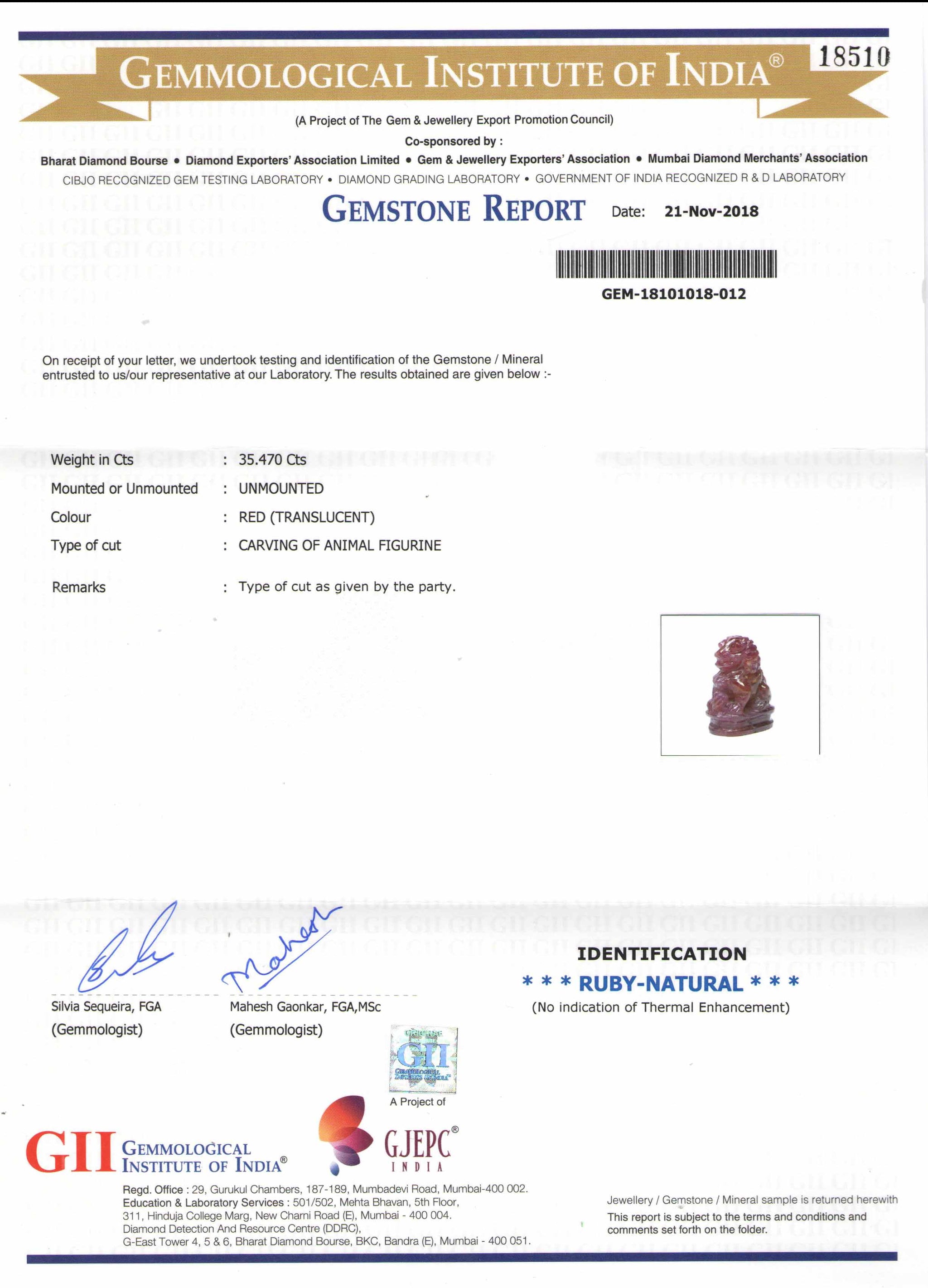 8801458-carved-glossy-pinkish-red-gii-guinea-natural-ruby-35.47-ct