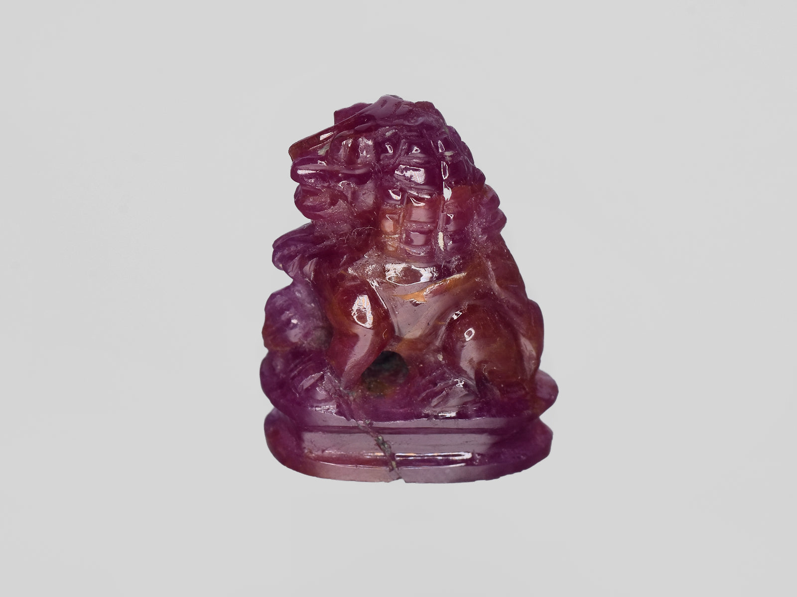 8801458-carved-glossy-pinkish-red-gii-guinea-natural-ruby-35.47-ct