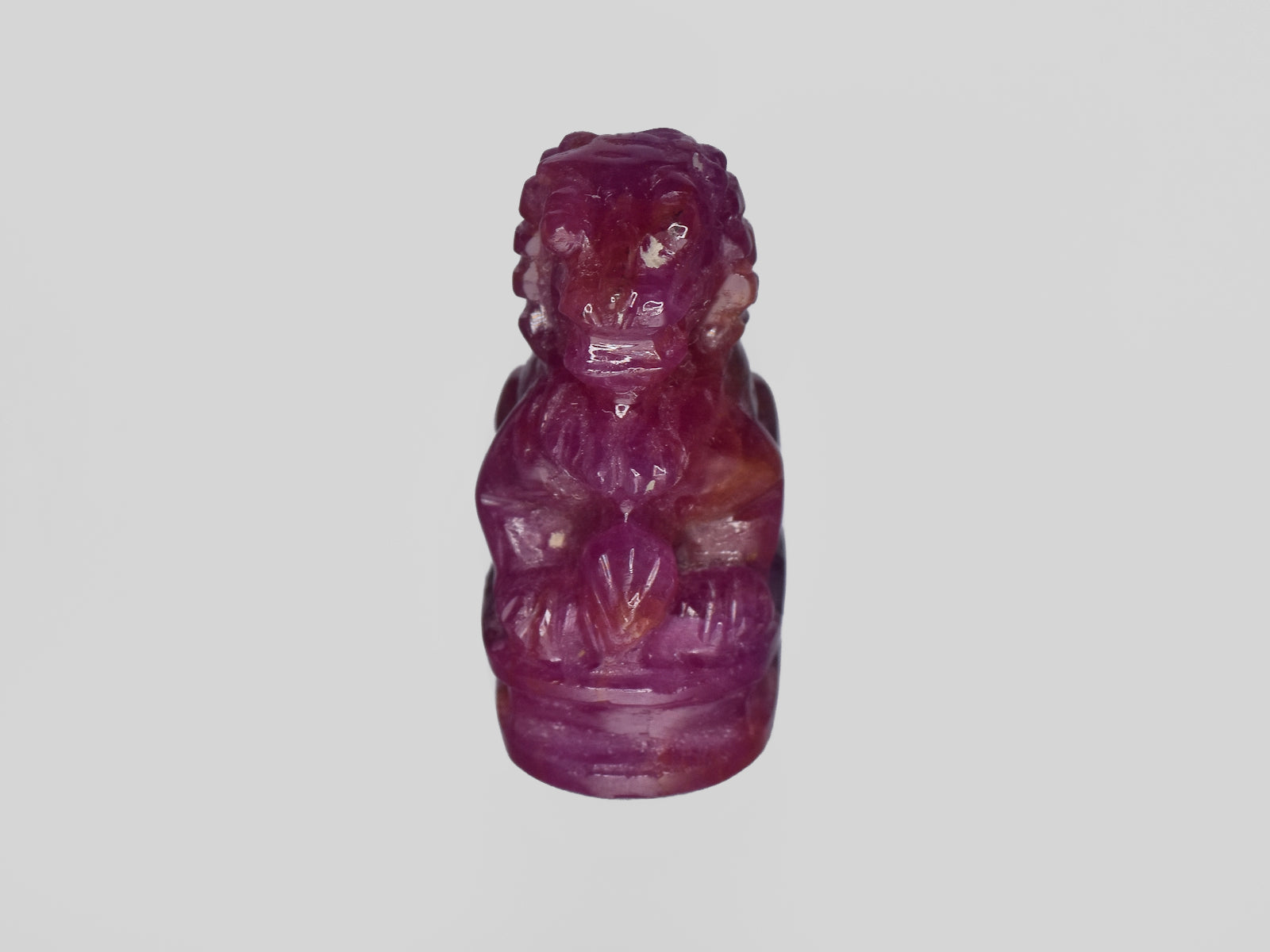 8801458-carved-glossy-pinkish-red-gii-guinea-natural-ruby-35.47-ct