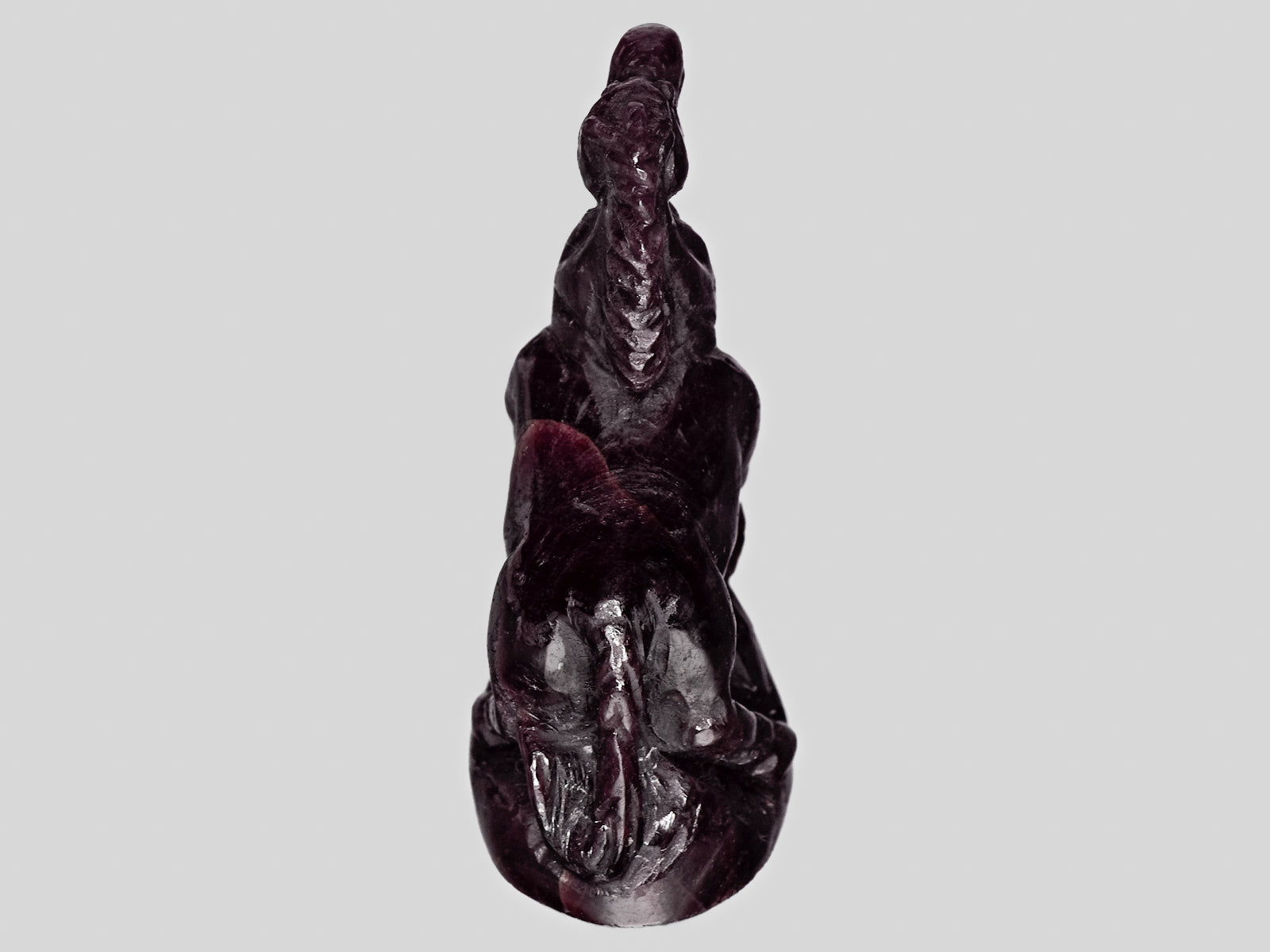 8801460-carved-dark-purple-red-gii-liberia-natural-ruby-63.28-ct