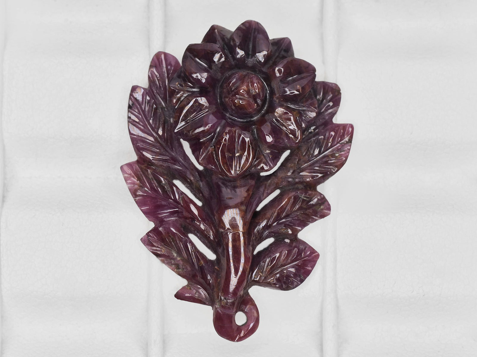 8801544-carved-dark-purple-red-gii-liberia-natural-ruby-28.30-ct
