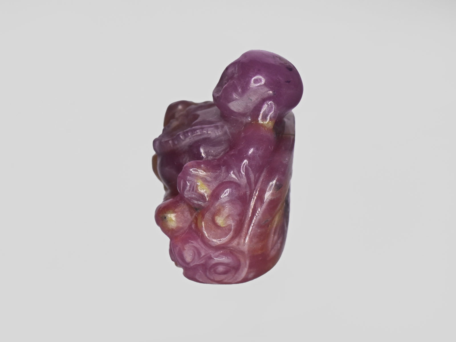8801465-carved-purplish-red-gii-guinea-natural-ruby-78.86-ct