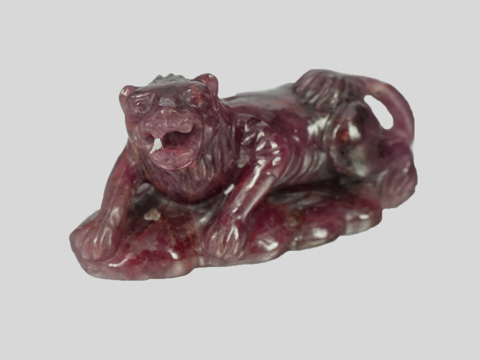 8801466-carved-purplish-orangish-red-gii-liberia-natural-ruby-87.20-ct