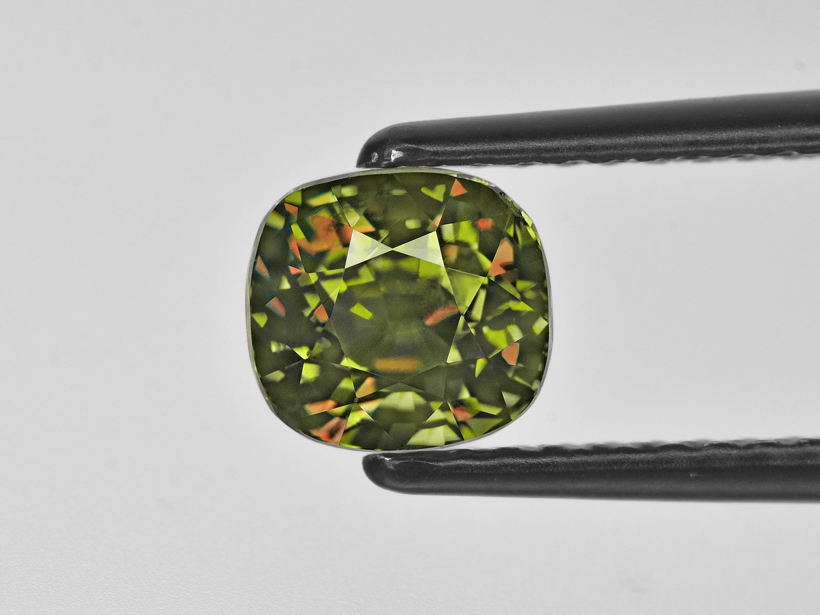 8801829-cushion-fiery-brownish-green-changing-to-red-grs-madagascar-natural-alexandrite-2.41-ct