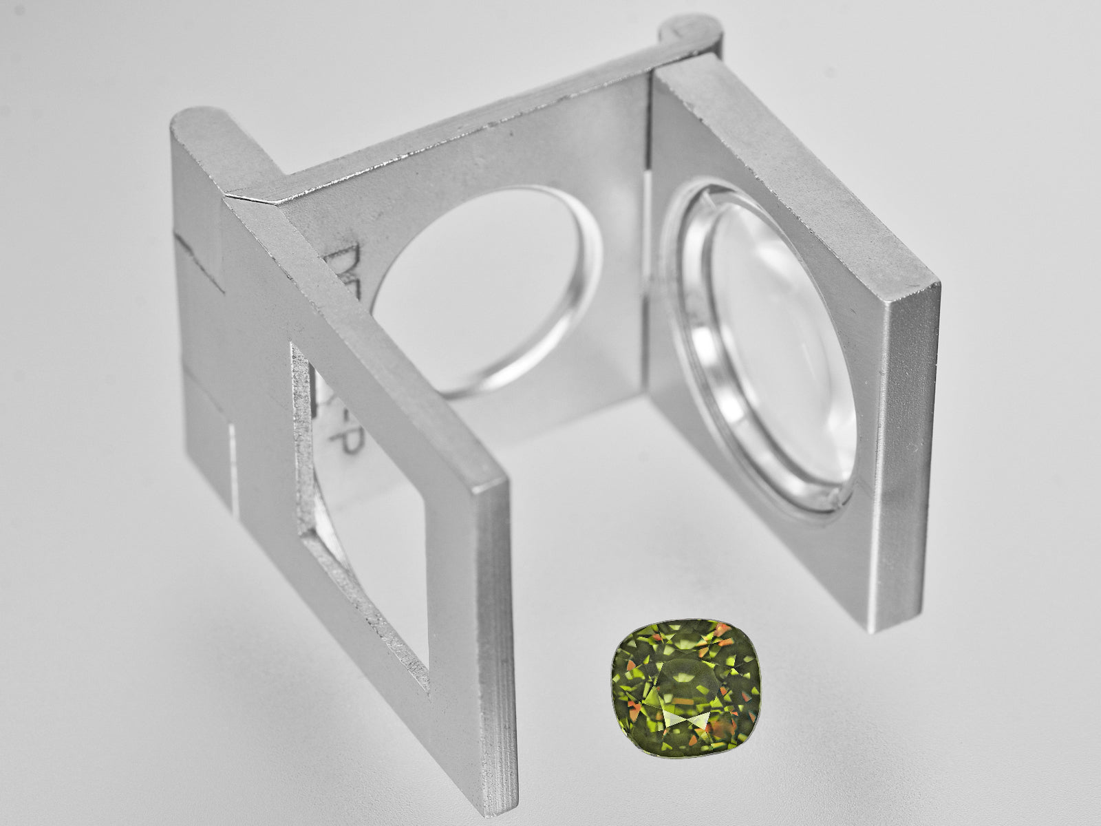 8801829-cushion-fiery-brownish-green-changing-to-red-grs-madagascar-natural-alexandrite-2.41-ct