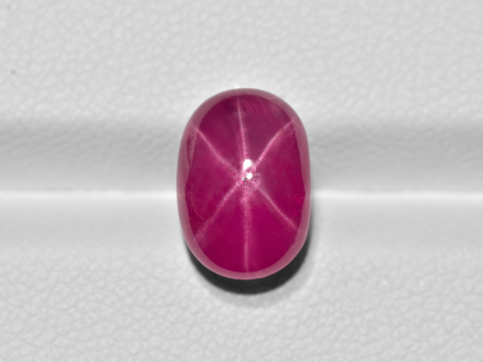 8801272-cabochon-deep-pinkish-red-grs-burma-natural-star-ruby-7.31-ct