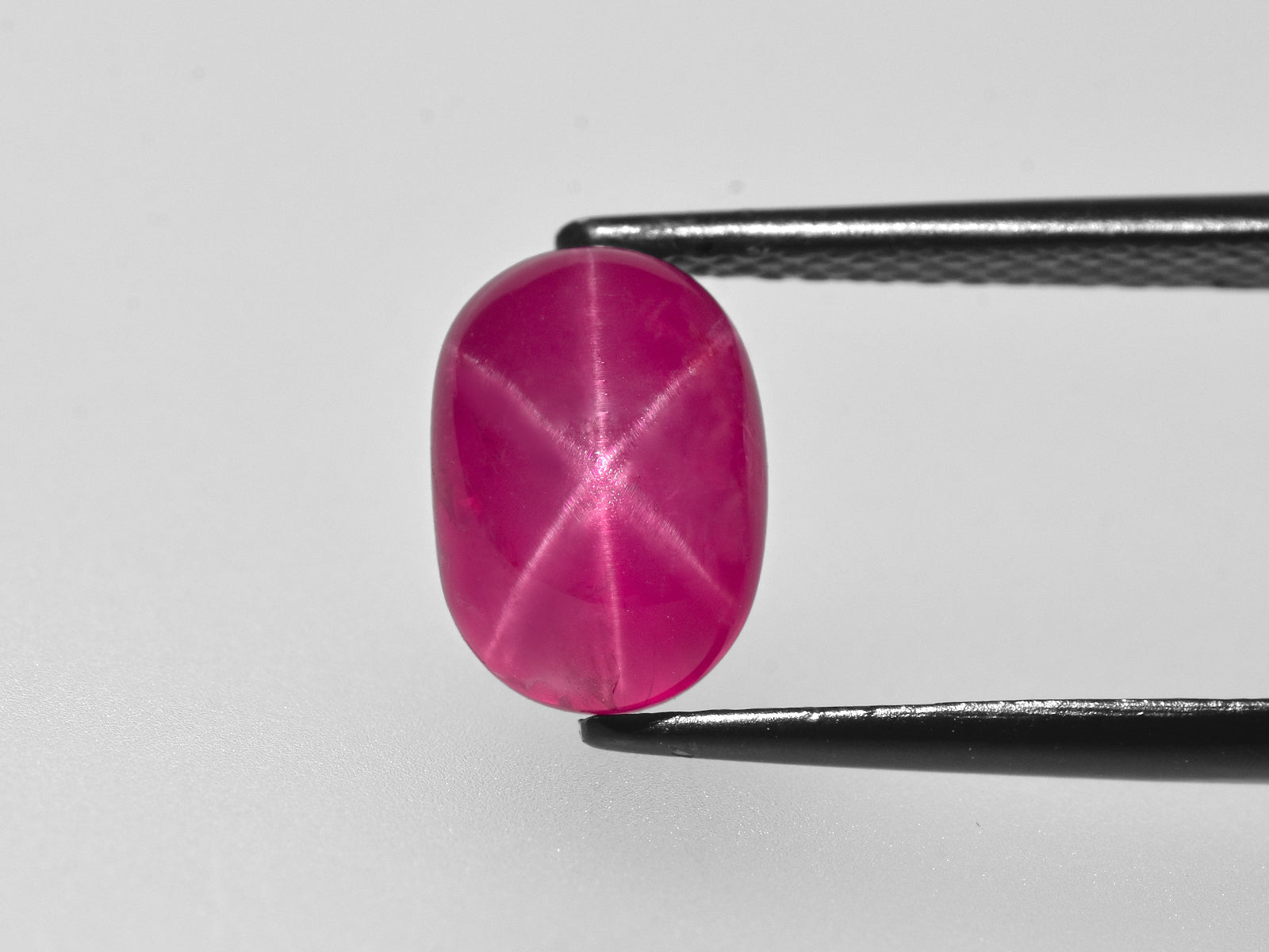 8801272-cabochon-deep-pinkish-red-grs-burma-natural-star-ruby-7.31-ct