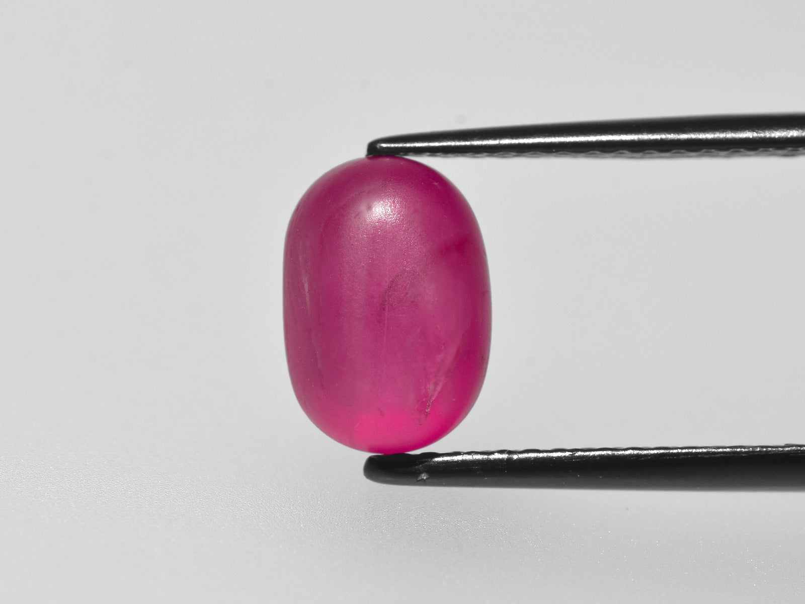 8801272-cabochon-deep-pinkish-red-grs-burma-natural-star-ruby-7.31-ct