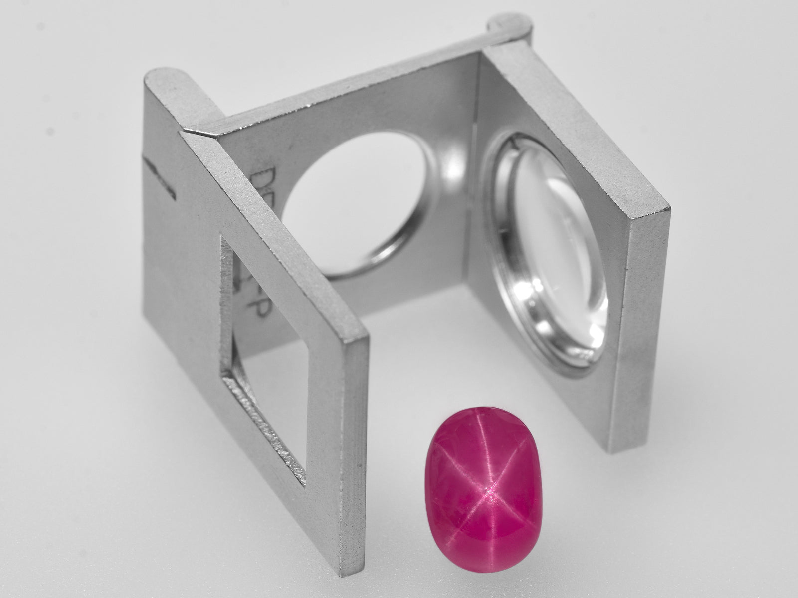 8801272-cabochon-deep-pinkish-red-grs-burma-natural-star-ruby-7.31-ct