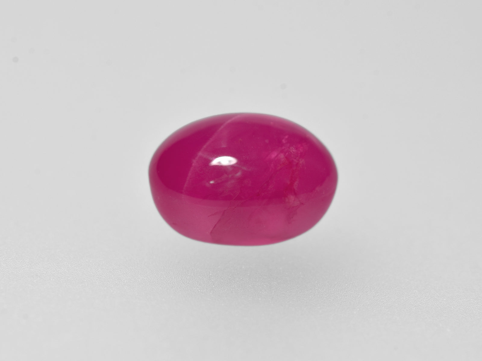 8801272-cabochon-deep-pinkish-red-grs-burma-natural-star-ruby-7.31-ct