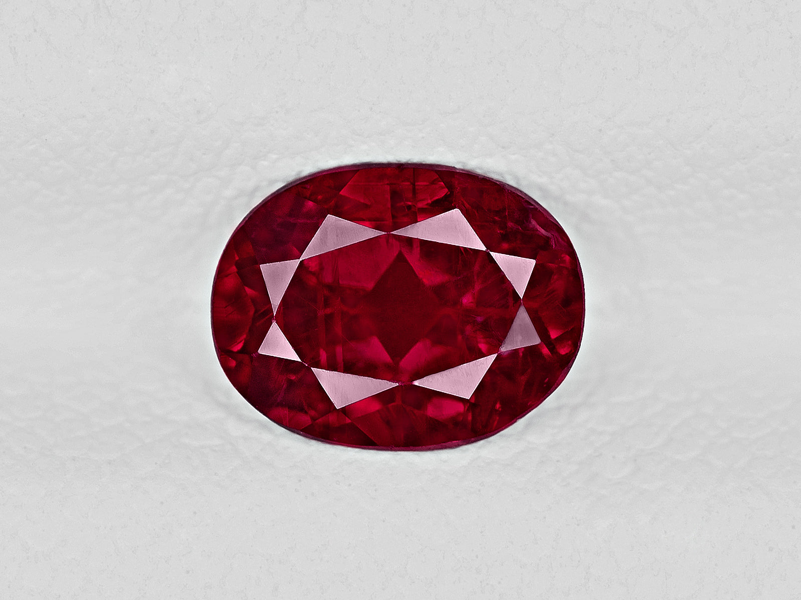 8801313-oval-vivid-pigeon-blood-red-grs-mozambique-natural-ruby-1.31-ct
