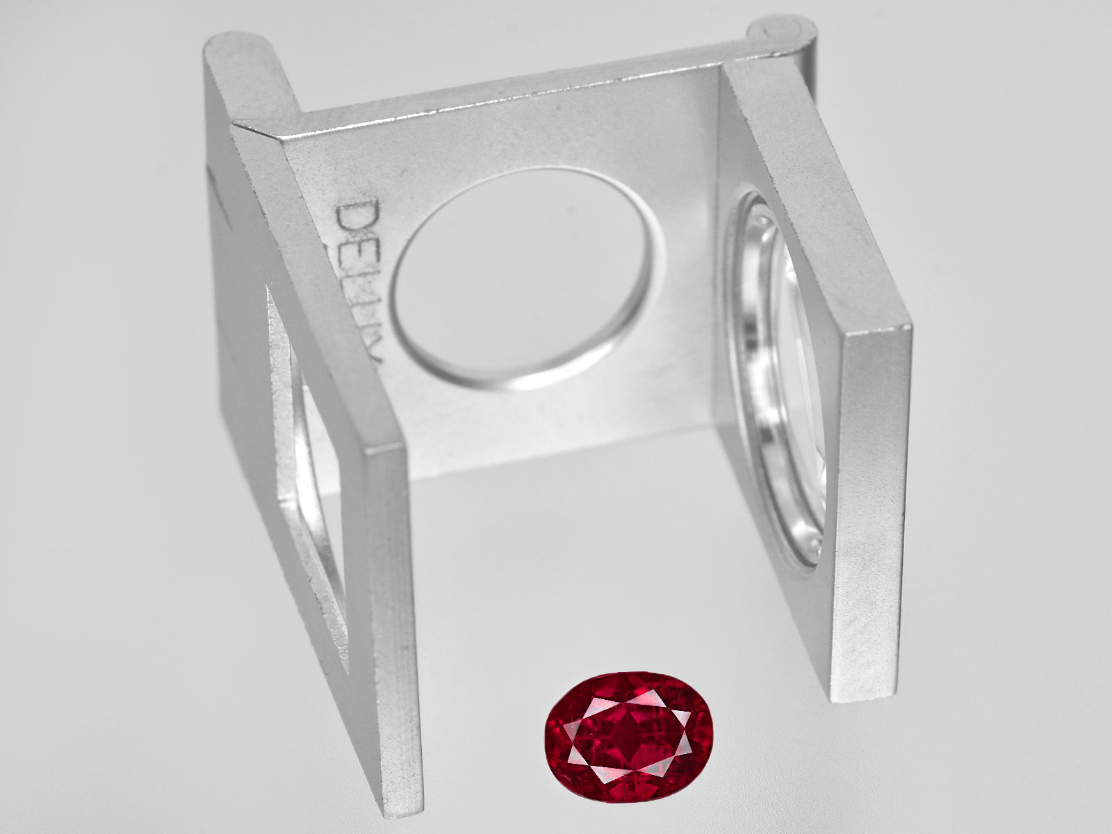 8801313-oval-vivid-pigeon-blood-red-grs-mozambique-natural-ruby-1.31-ct