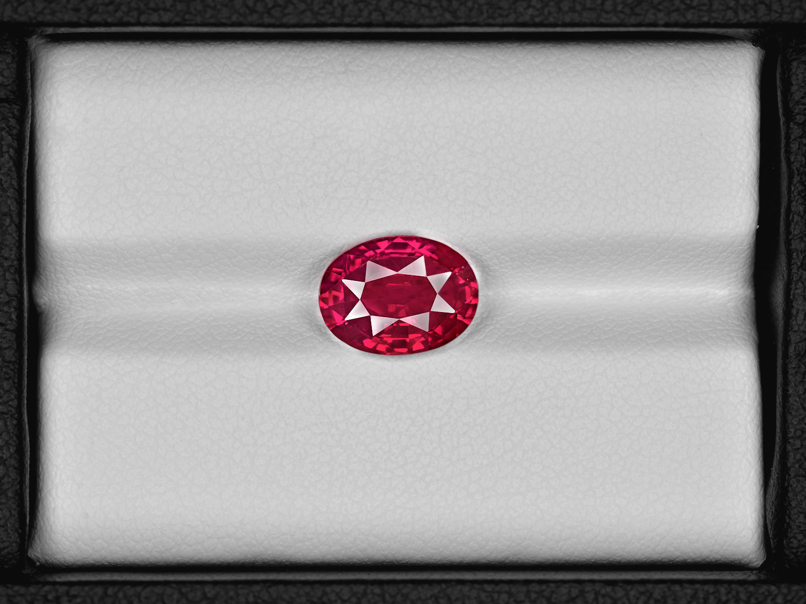 8801319-oval-fiery-vivid-red-with-slight-purplish-hue-grs-mozambique-natural-ruby-3.04-ct