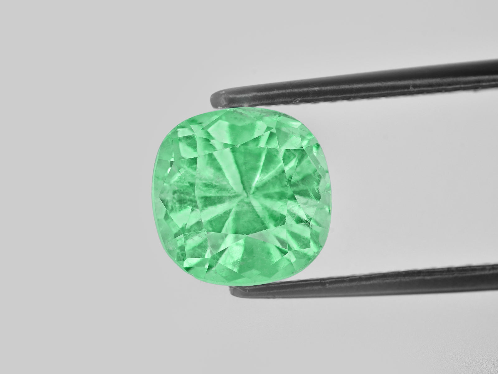 8801278-cushion-lustrous-pastel-green-colombia-natural-emerald-5.44-ct