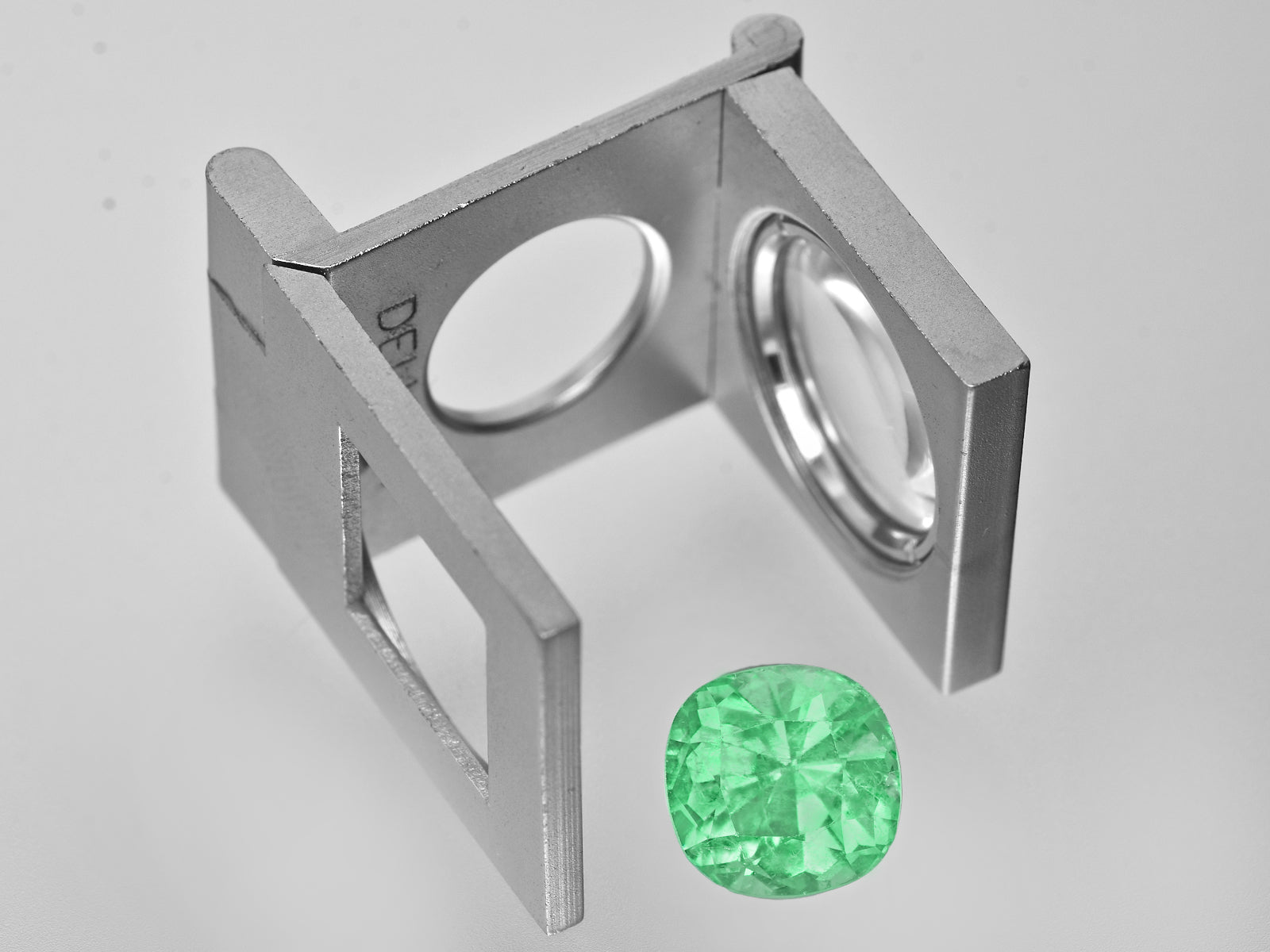 8801278-cushion-lustrous-pastel-green-colombia-natural-emerald-5.44-ct