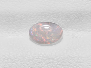 8801440-cabochon-light-greyish-yellow-with-multi-color-flashes-igi-australia-natural-white-opal-0.29-ct