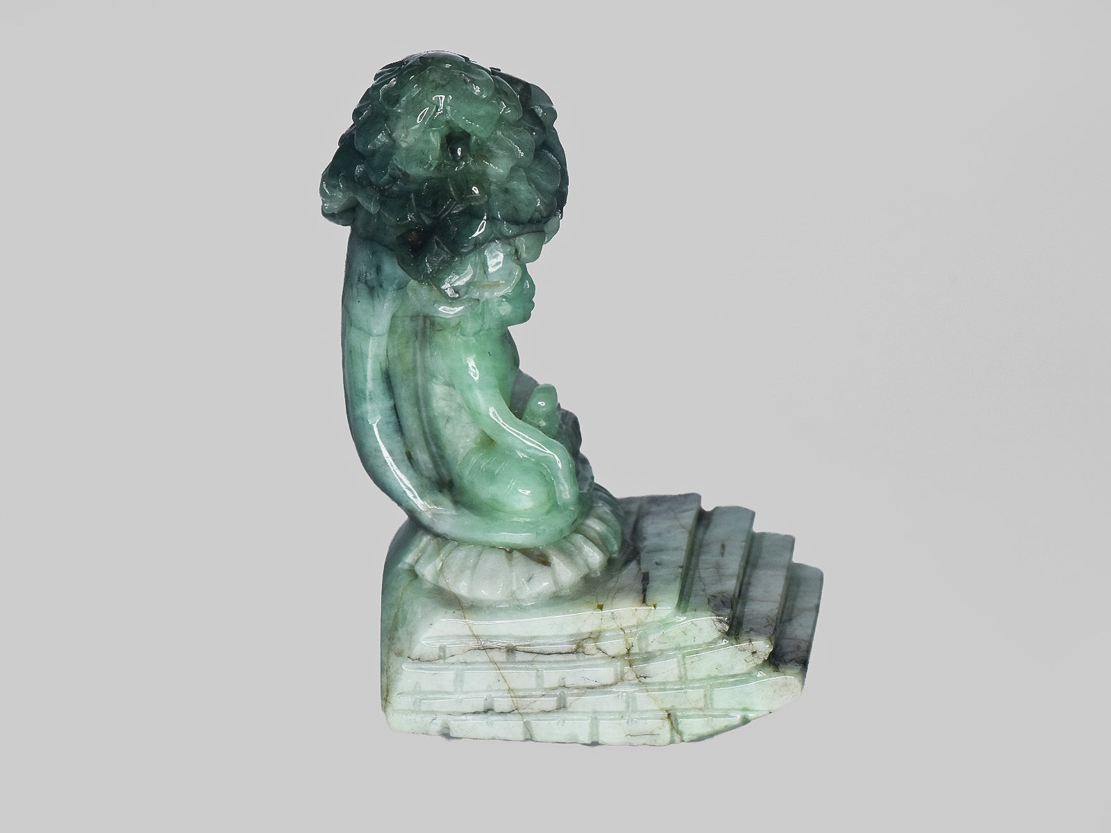 8801468-carved-light-green-gii-zambia-natural-emerald-99.31-ct
