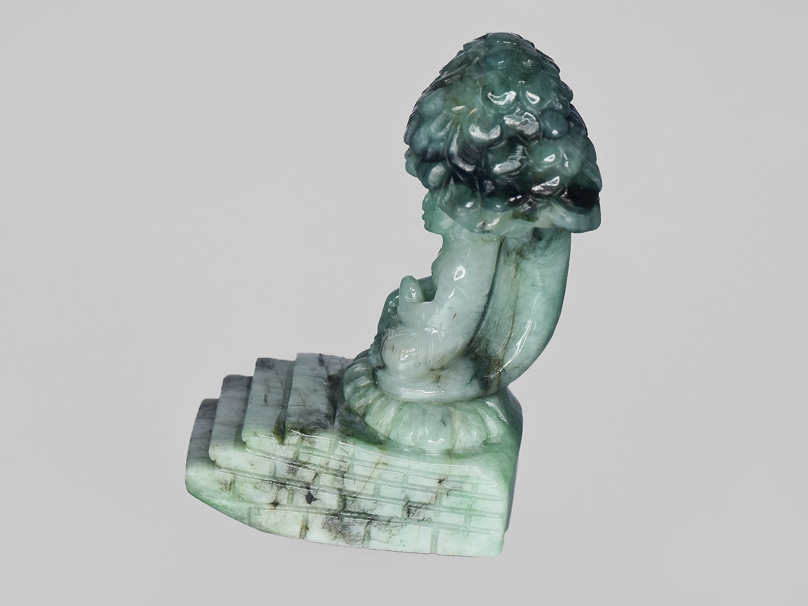 8801468-carved-light-green-gii-zambia-natural-emerald-99.31-ct