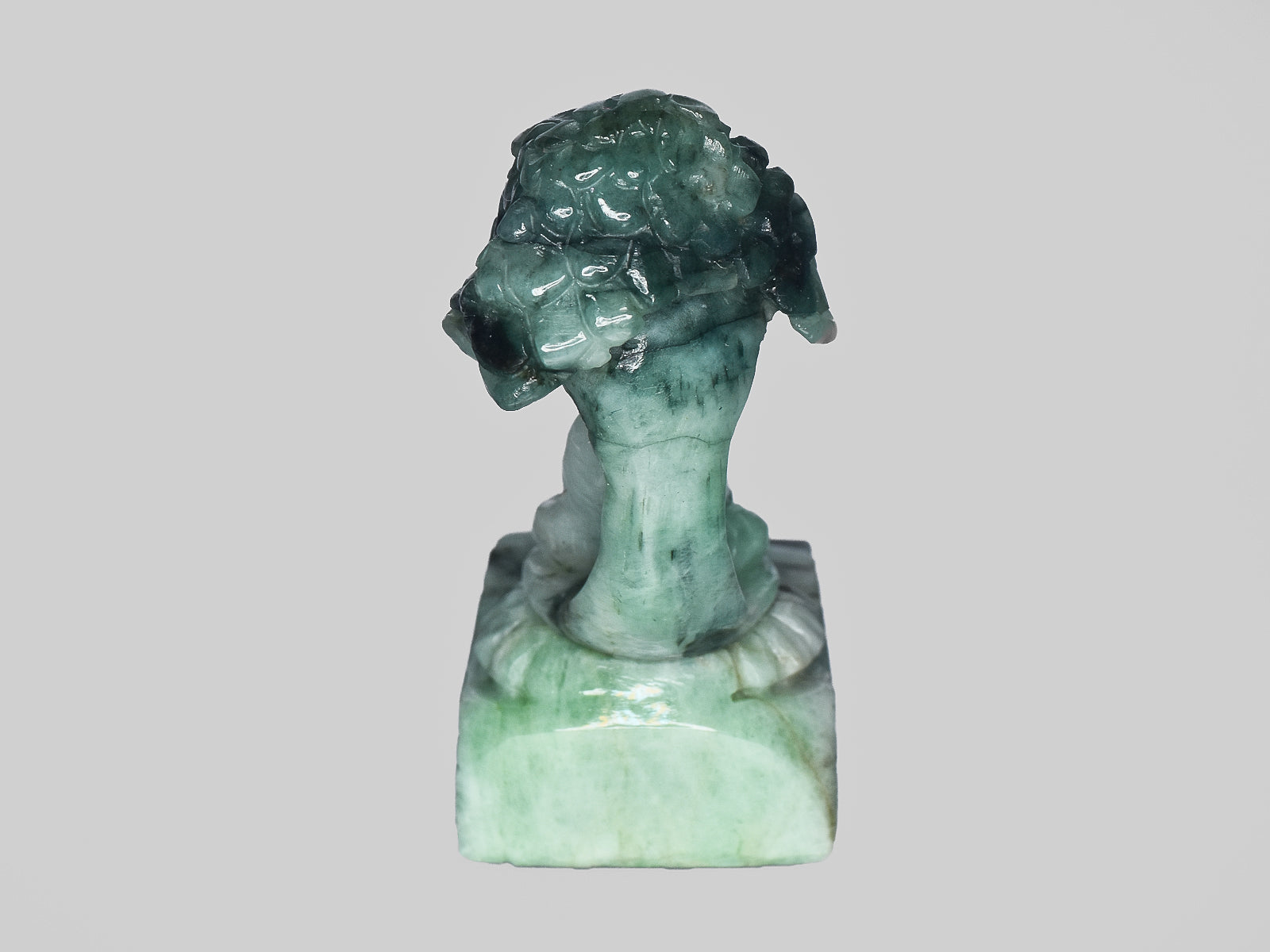 8801468-carved-light-green-gii-zambia-natural-emerald-99.31-ct