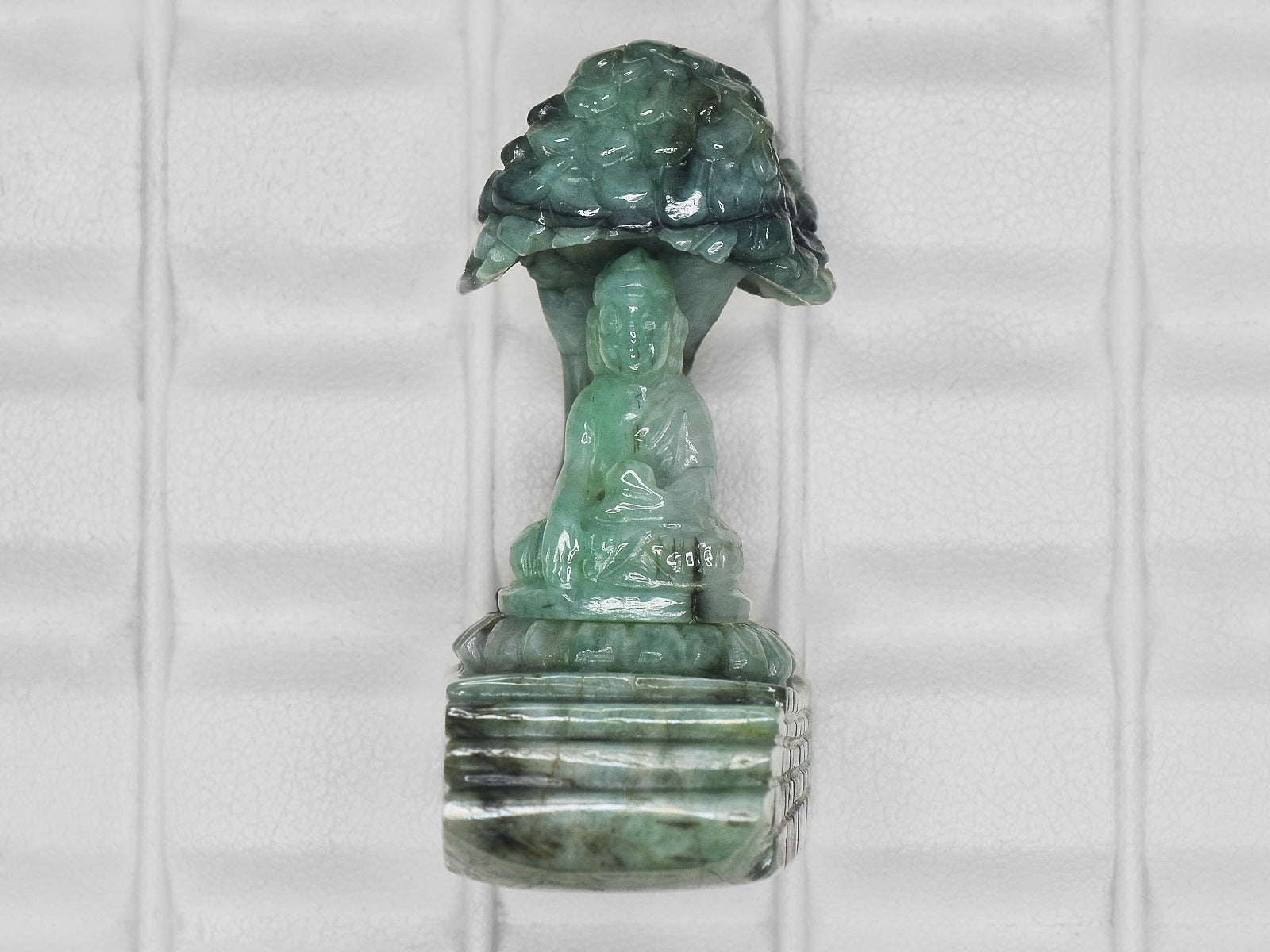 8801468-carved-light-green-gii-zambia-natural-emerald-99.31-ct