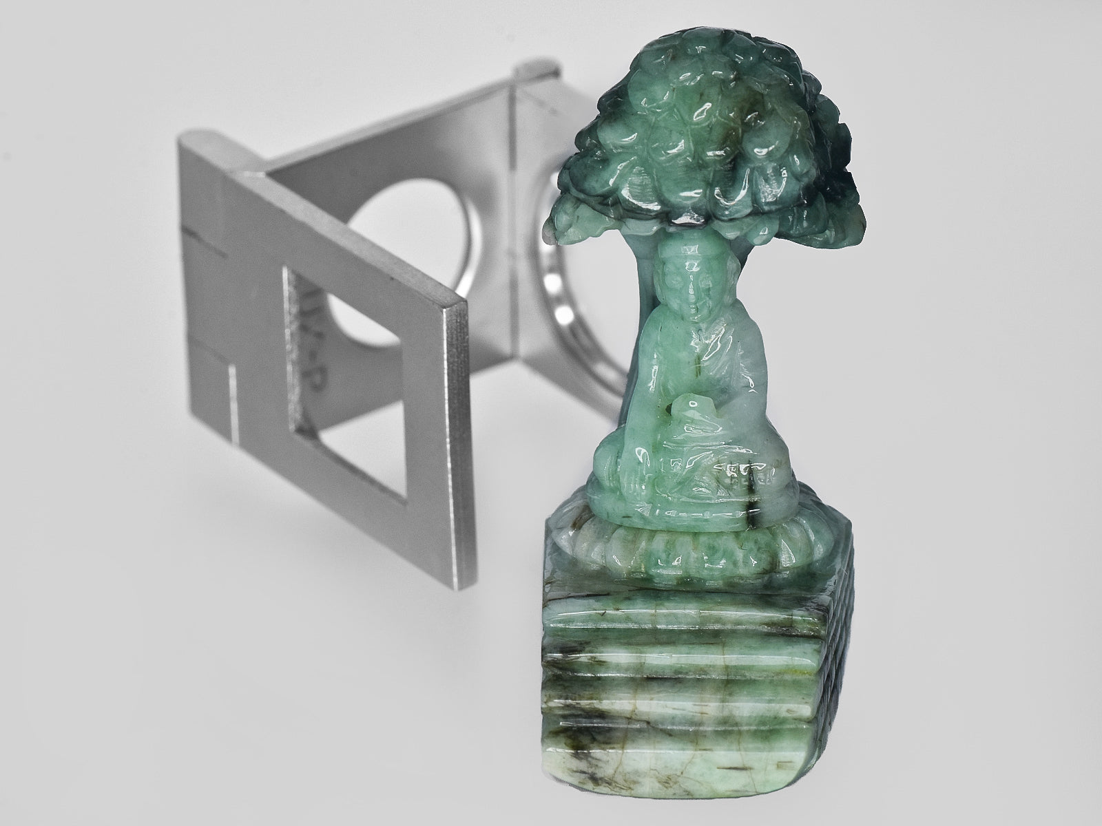 8801468-carved-light-green-gii-zambia-natural-emerald-99.31-ct